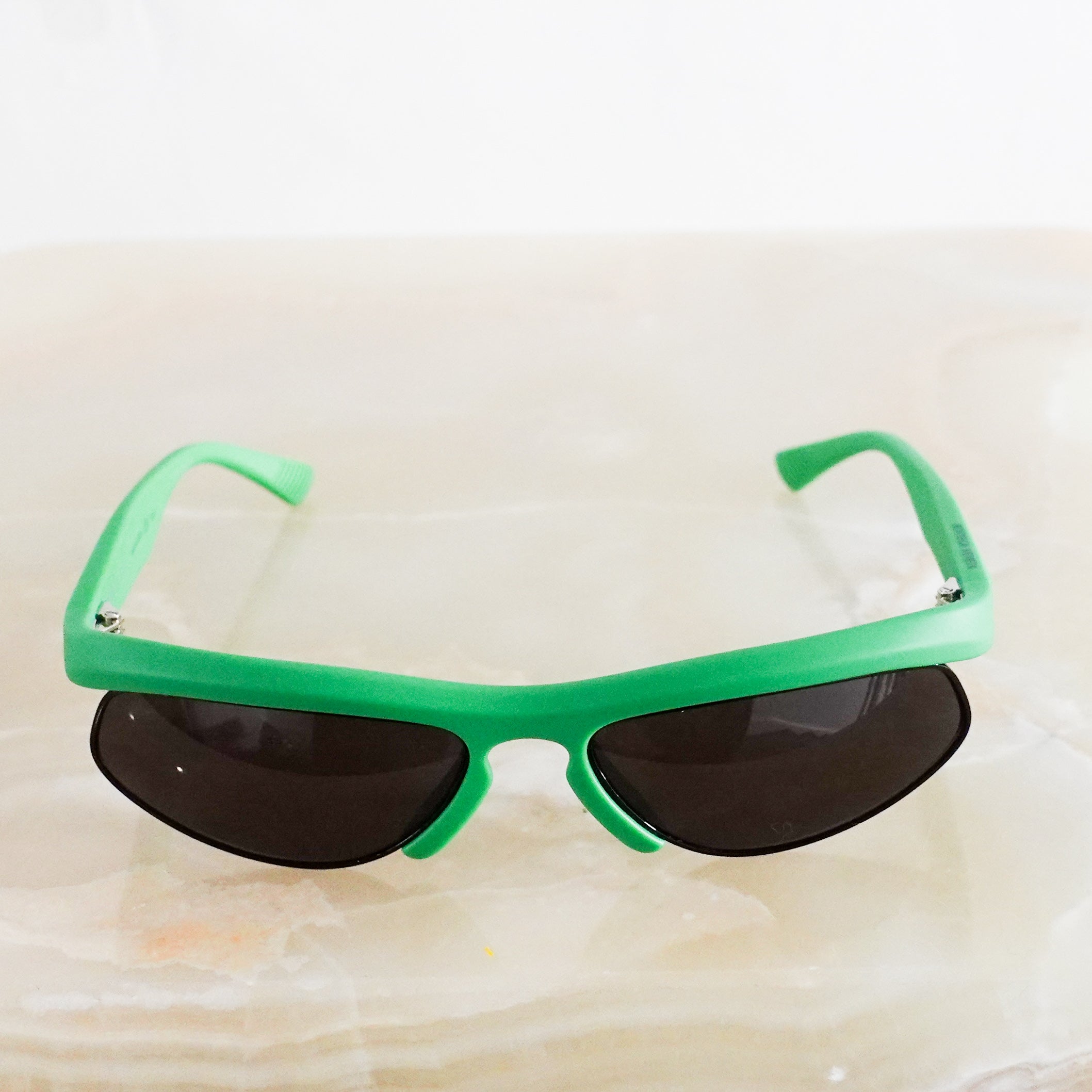 Green frame sunglasses RRP £200