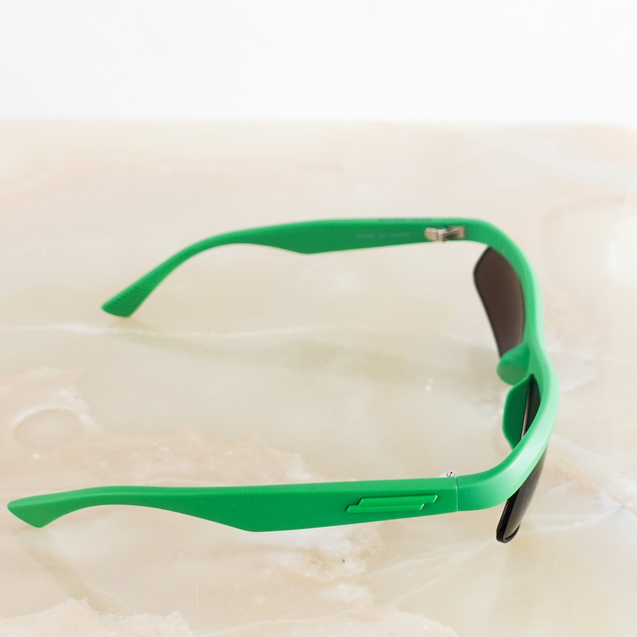 Green frame sunglasses RRP £200