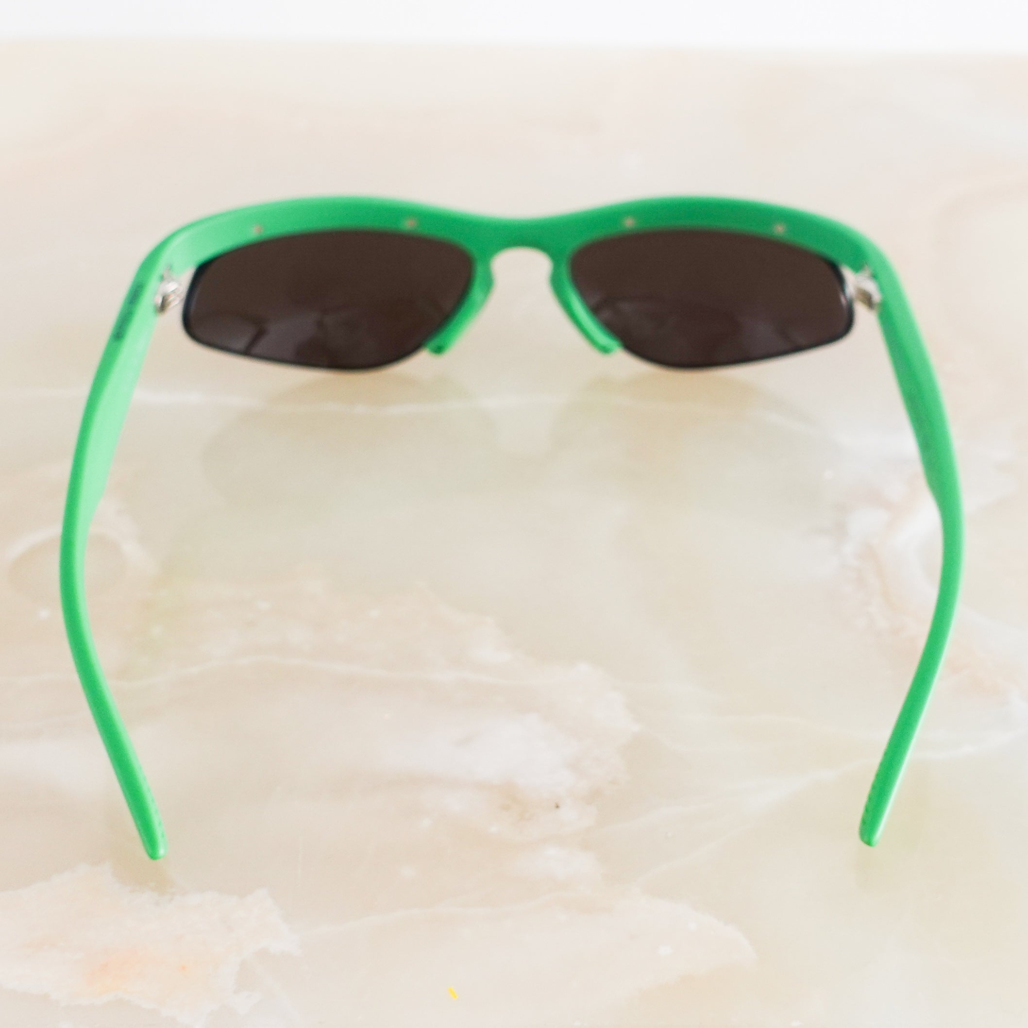 Green frame sunglasses RRP £200