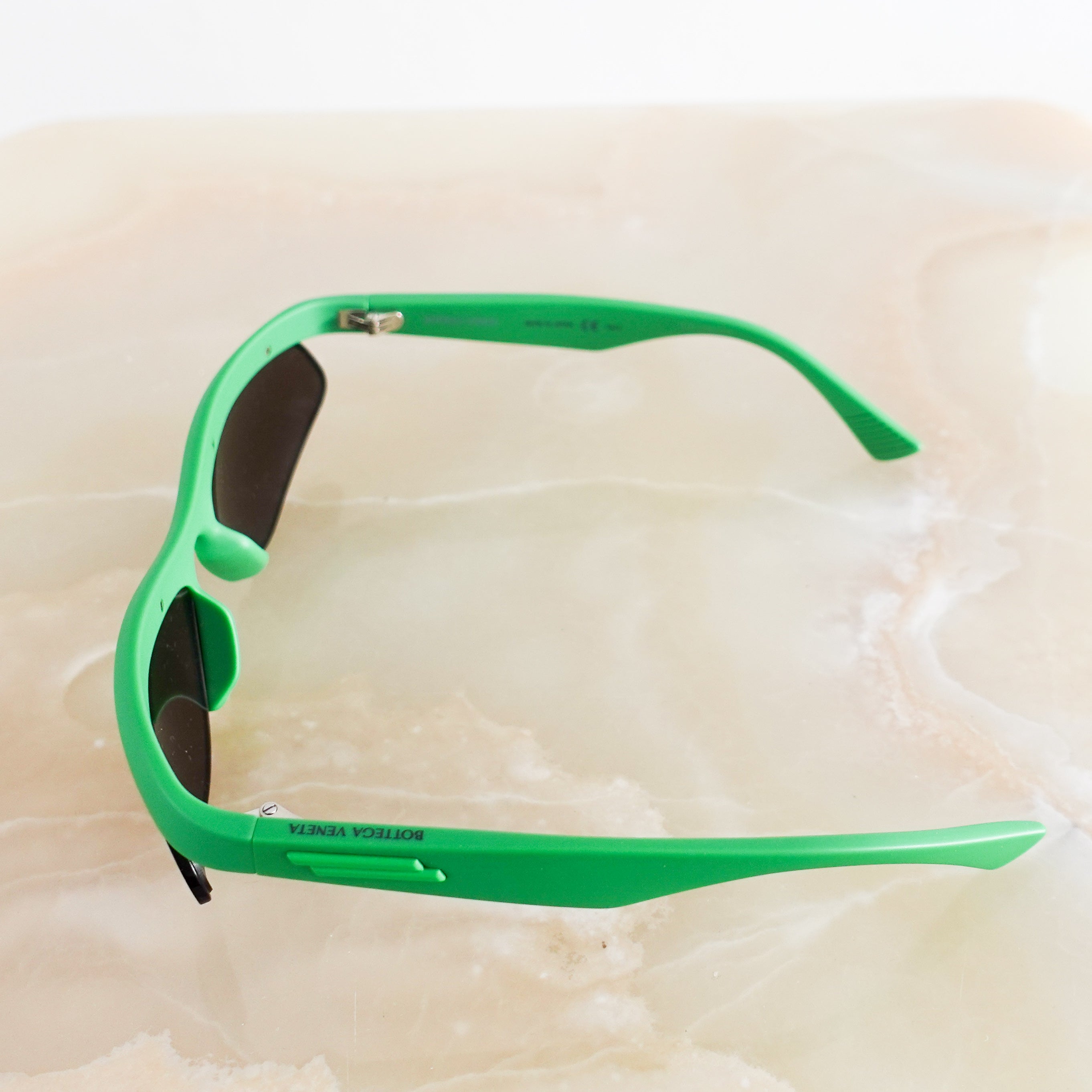 Green frame sunglasses RRP £200