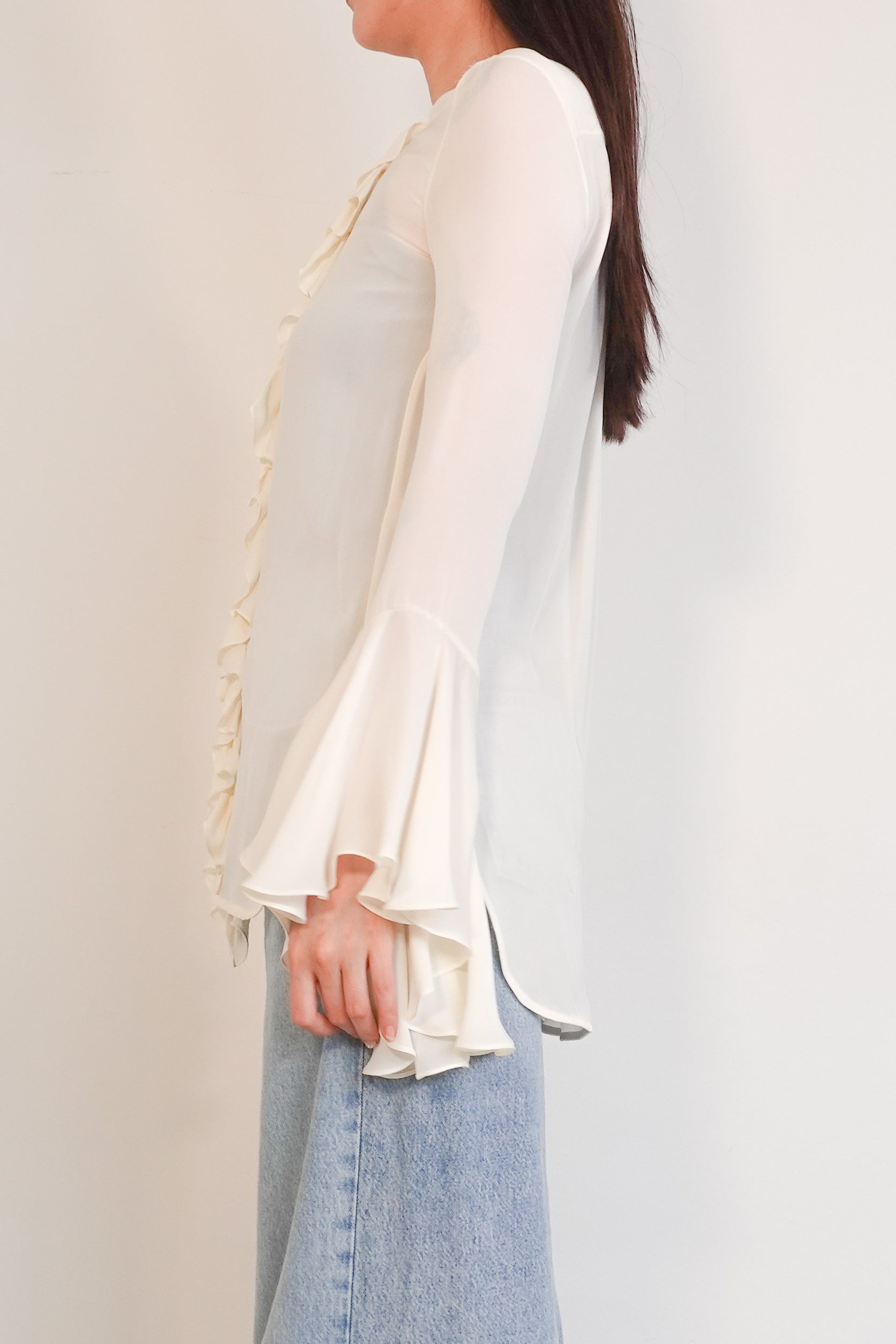 Cream ruffled blouse