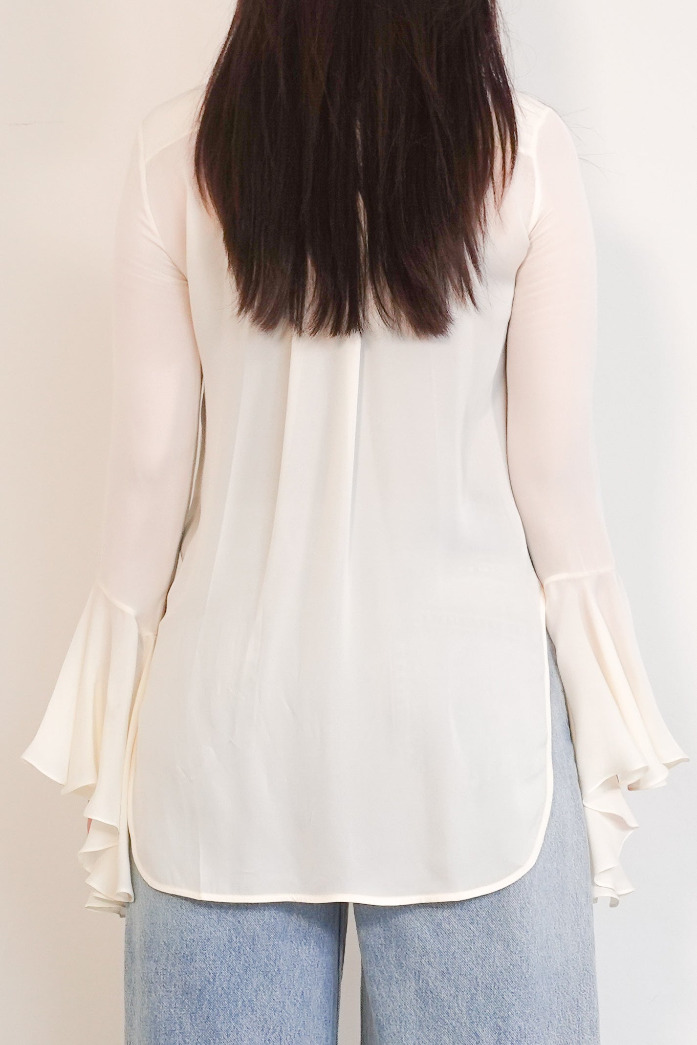 Cream ruffled blouse