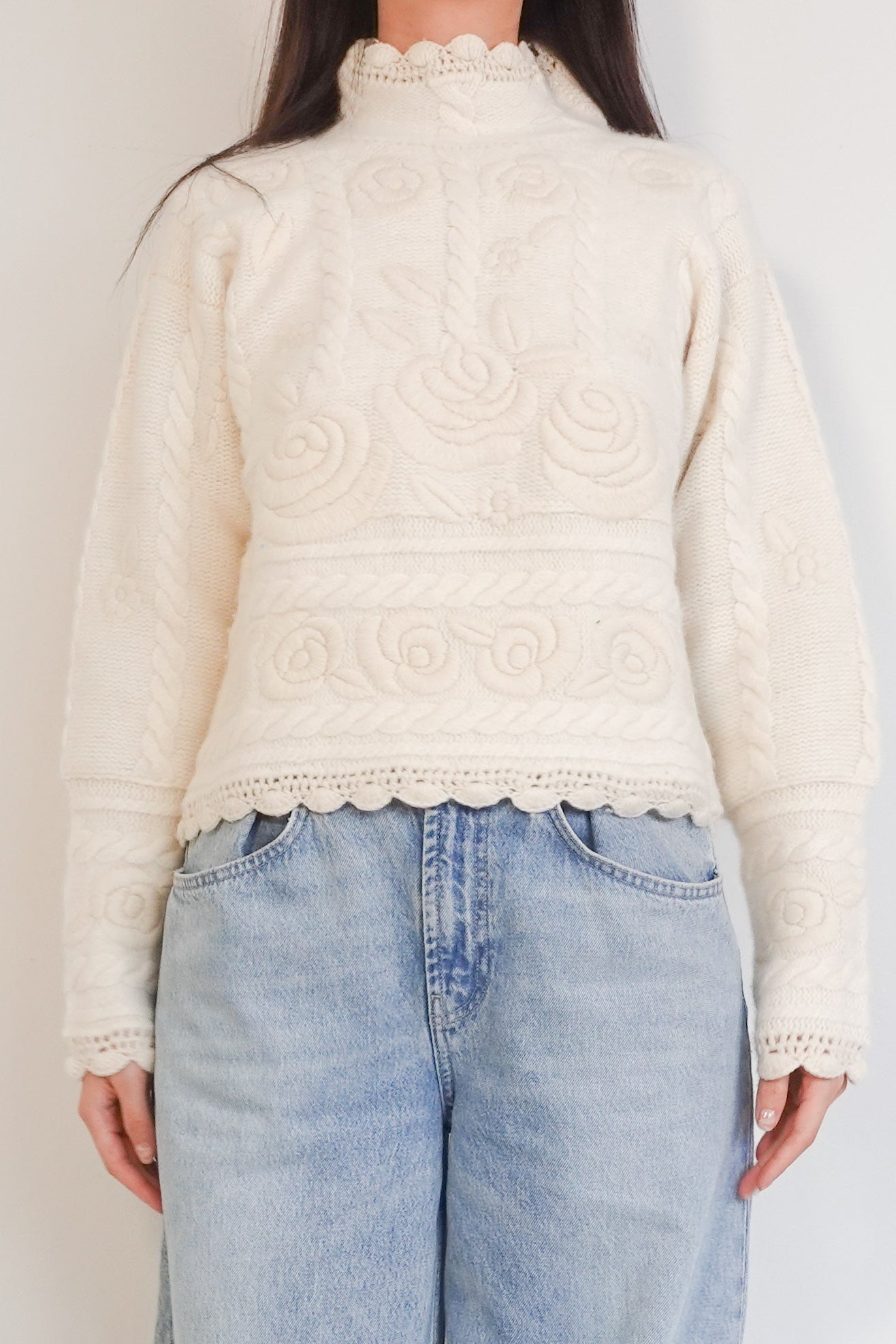 Floral embossed polo neck sweater