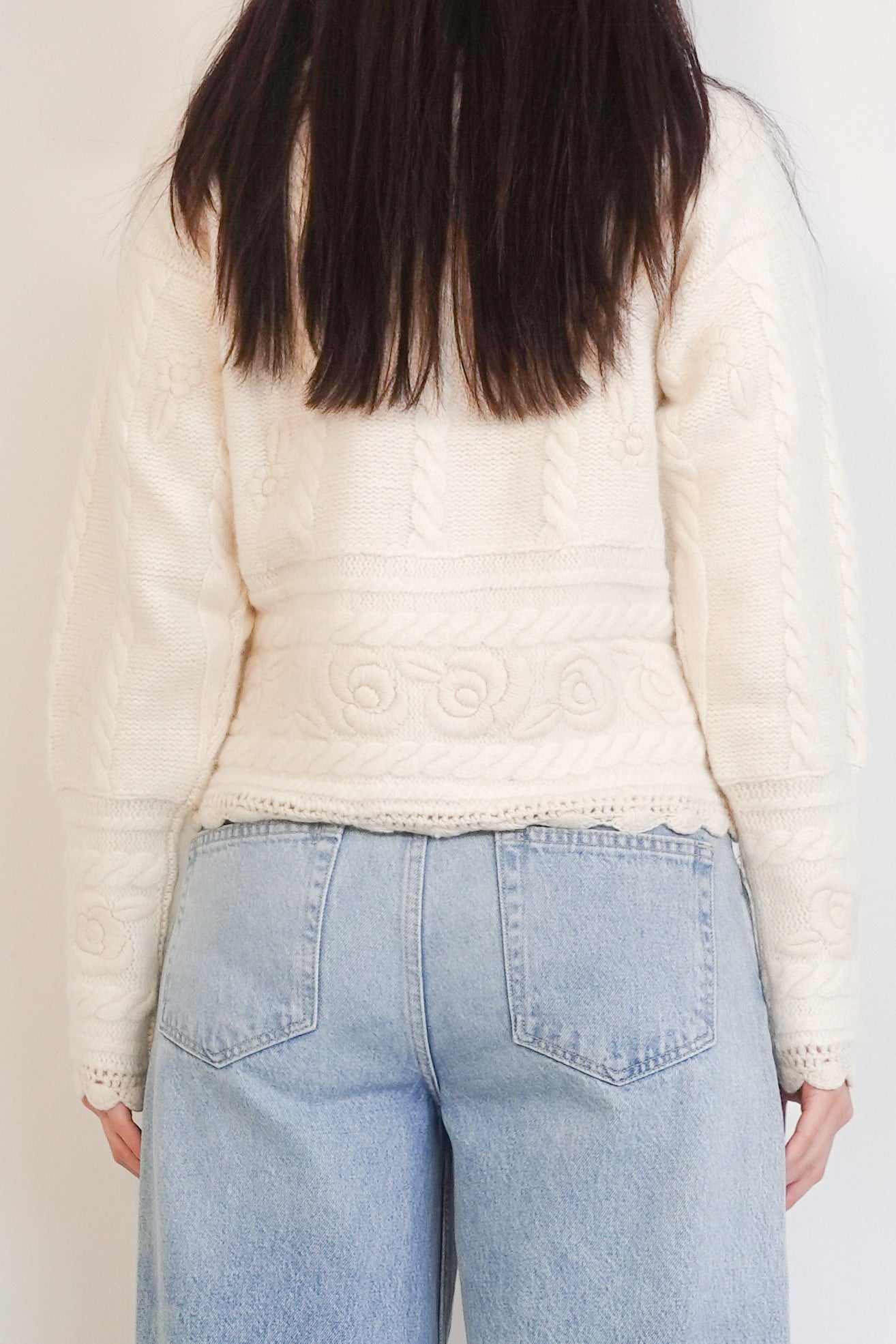 Floral embossed polo neck sweater