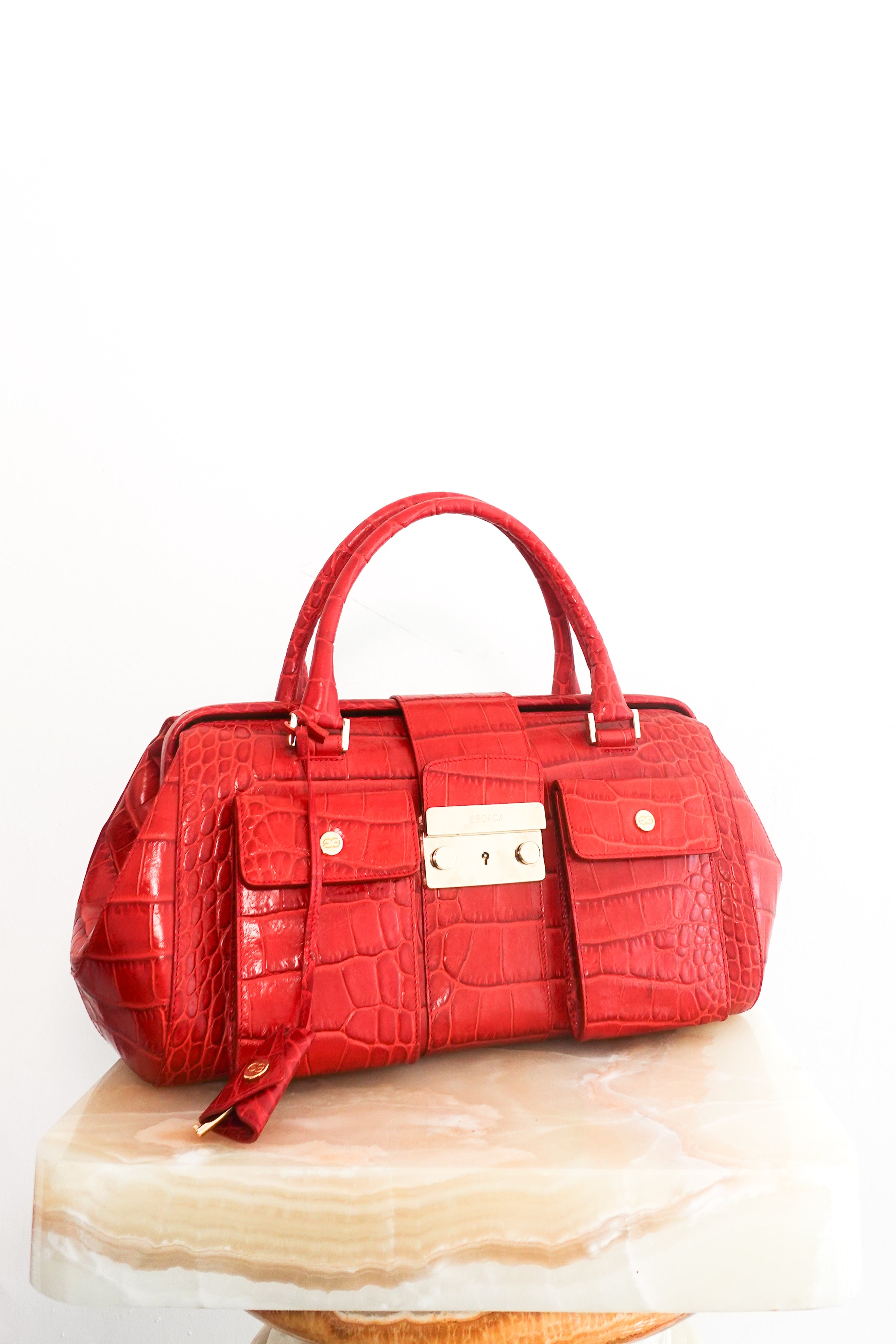 Red embossed handbag