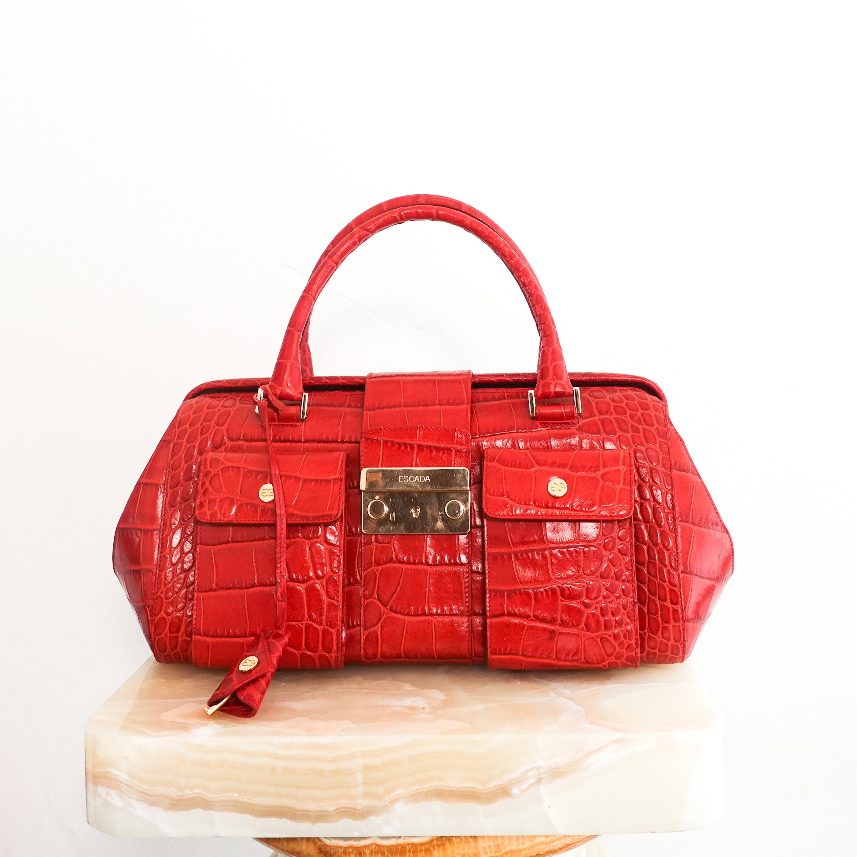 Red embossed handbag