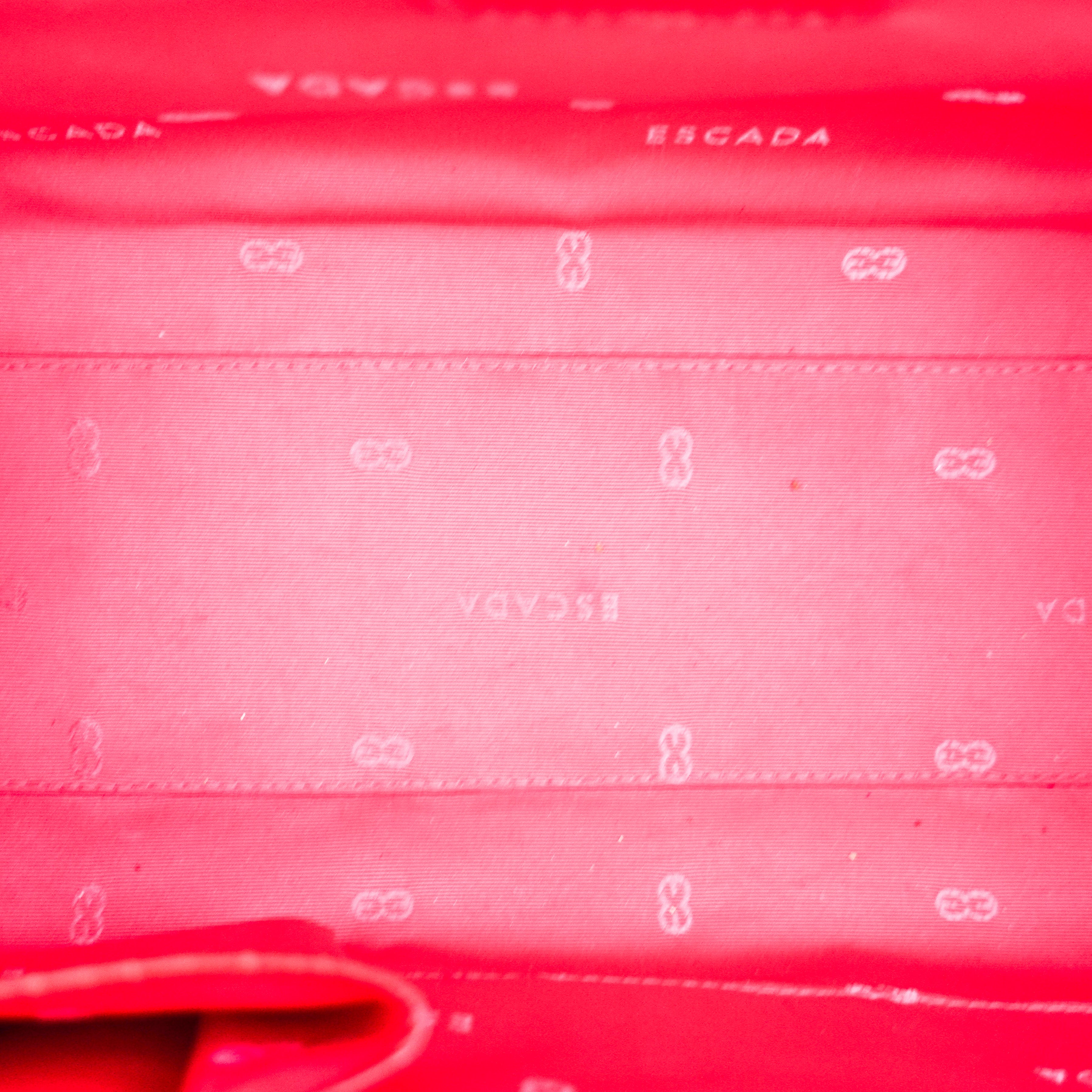 Red embossed handbag