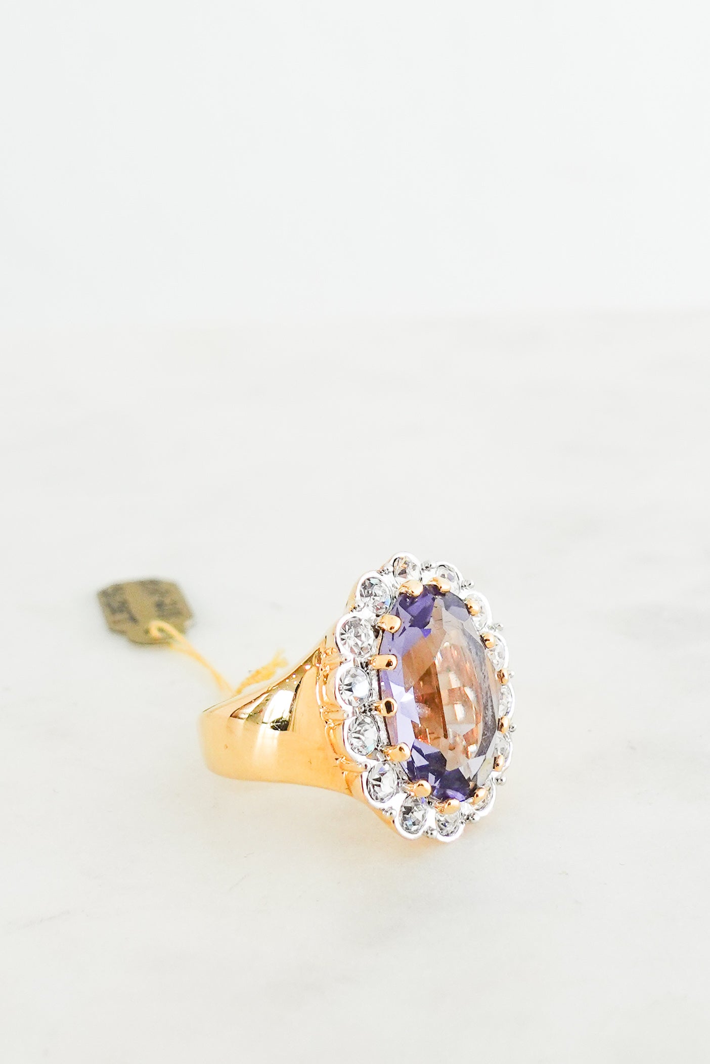 Gold plated Purple ring with colourless crystals