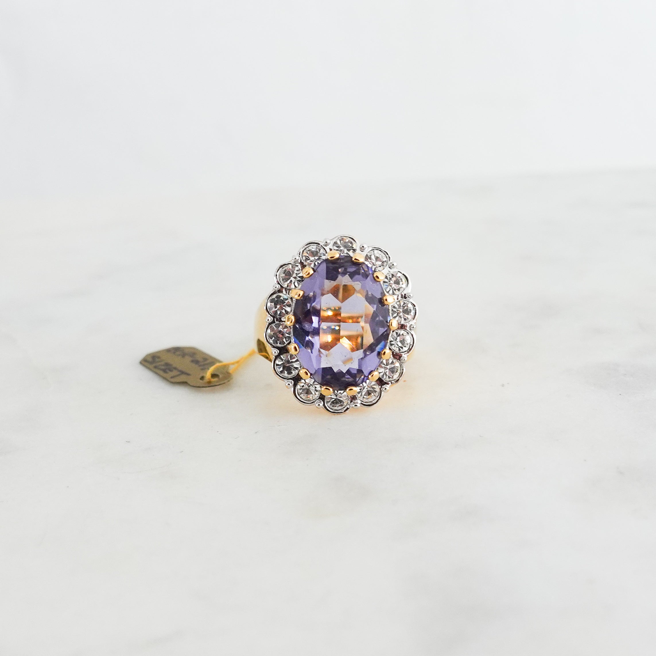 Gold plated Purple ring with colourless crystals