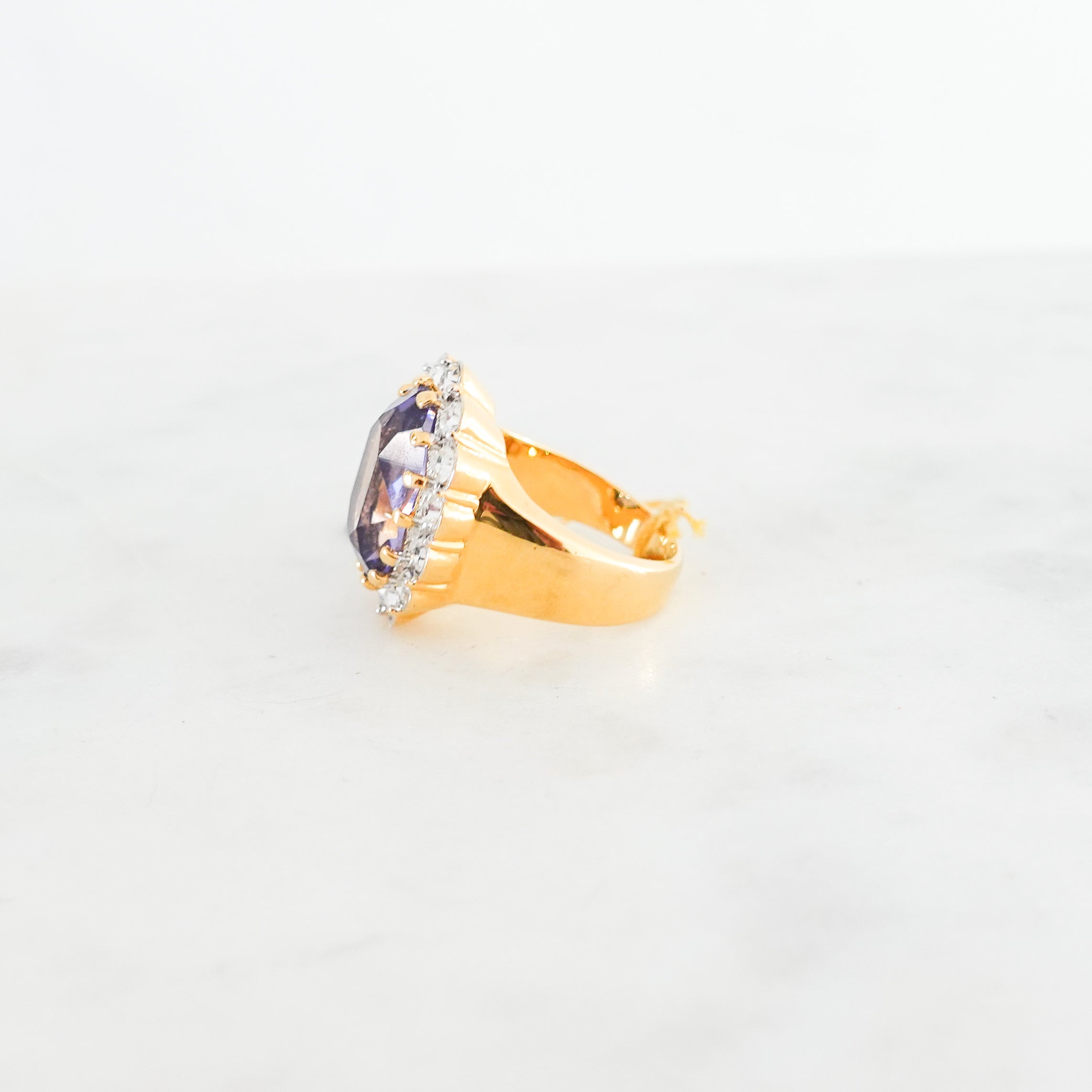 Gold plated Purple ring with colourless crystals