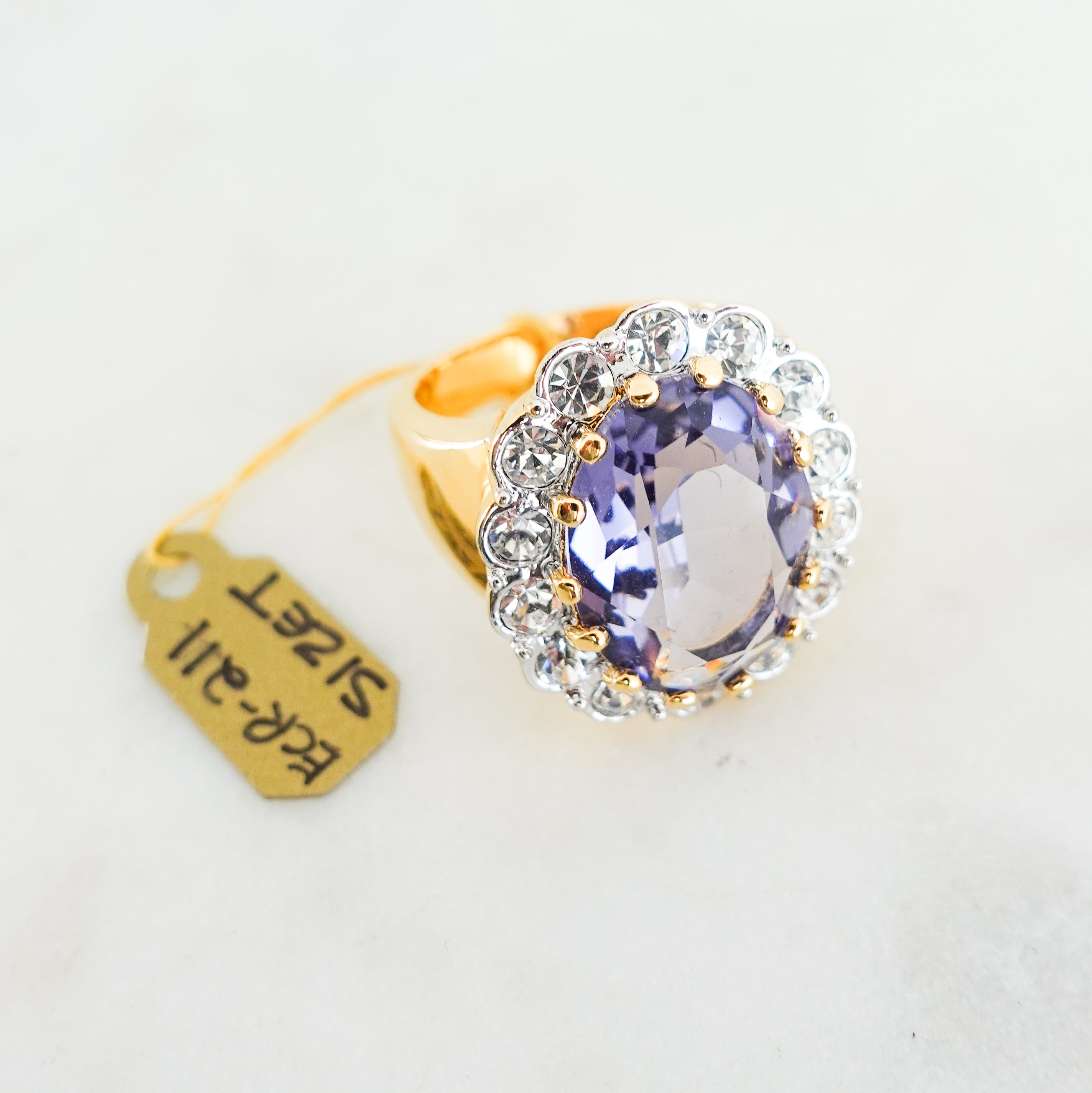 Gold plated Purple ring with colourless crystals