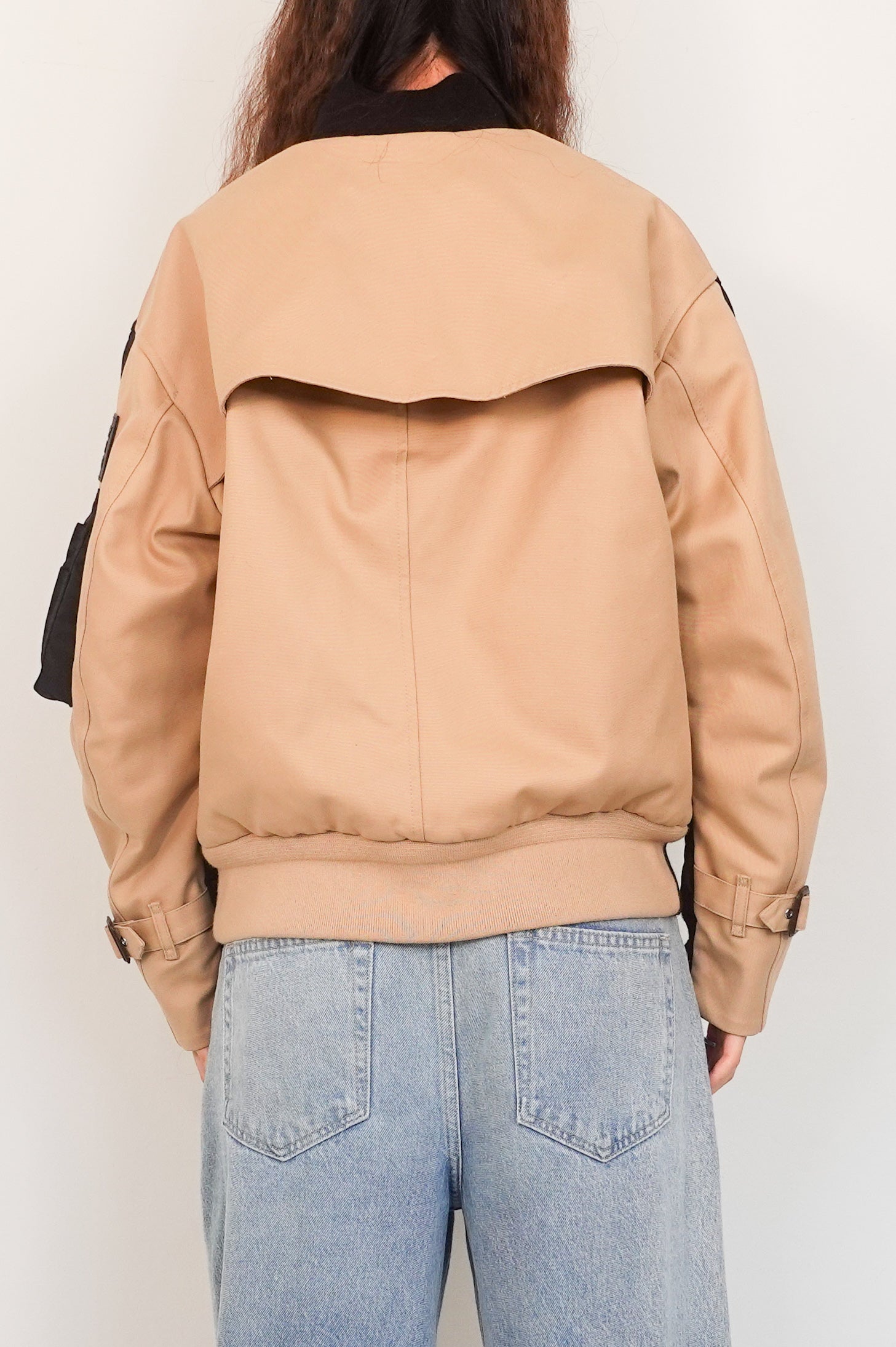 Black and beige bomber jacket