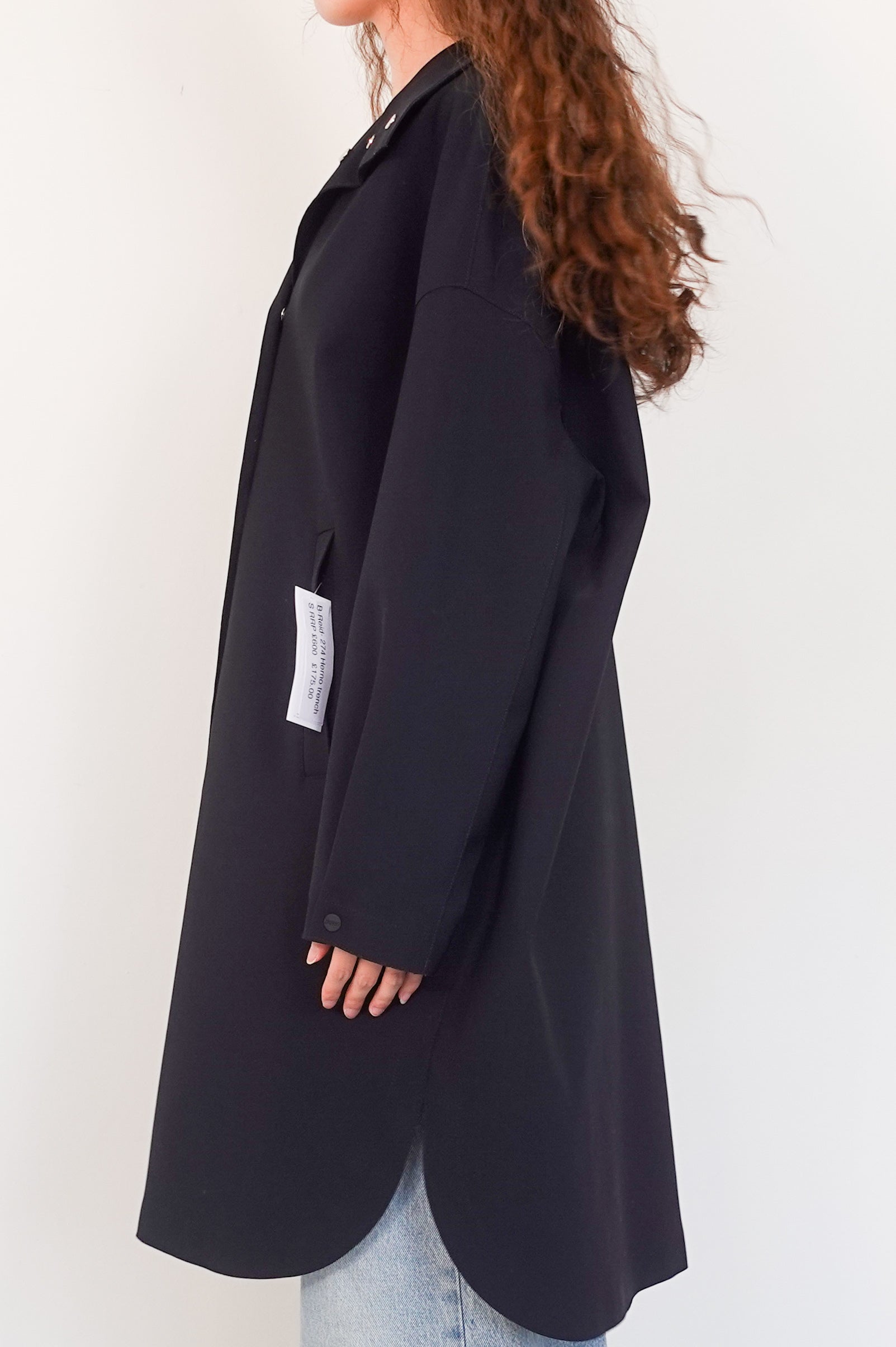 Black funnel neck trench coat