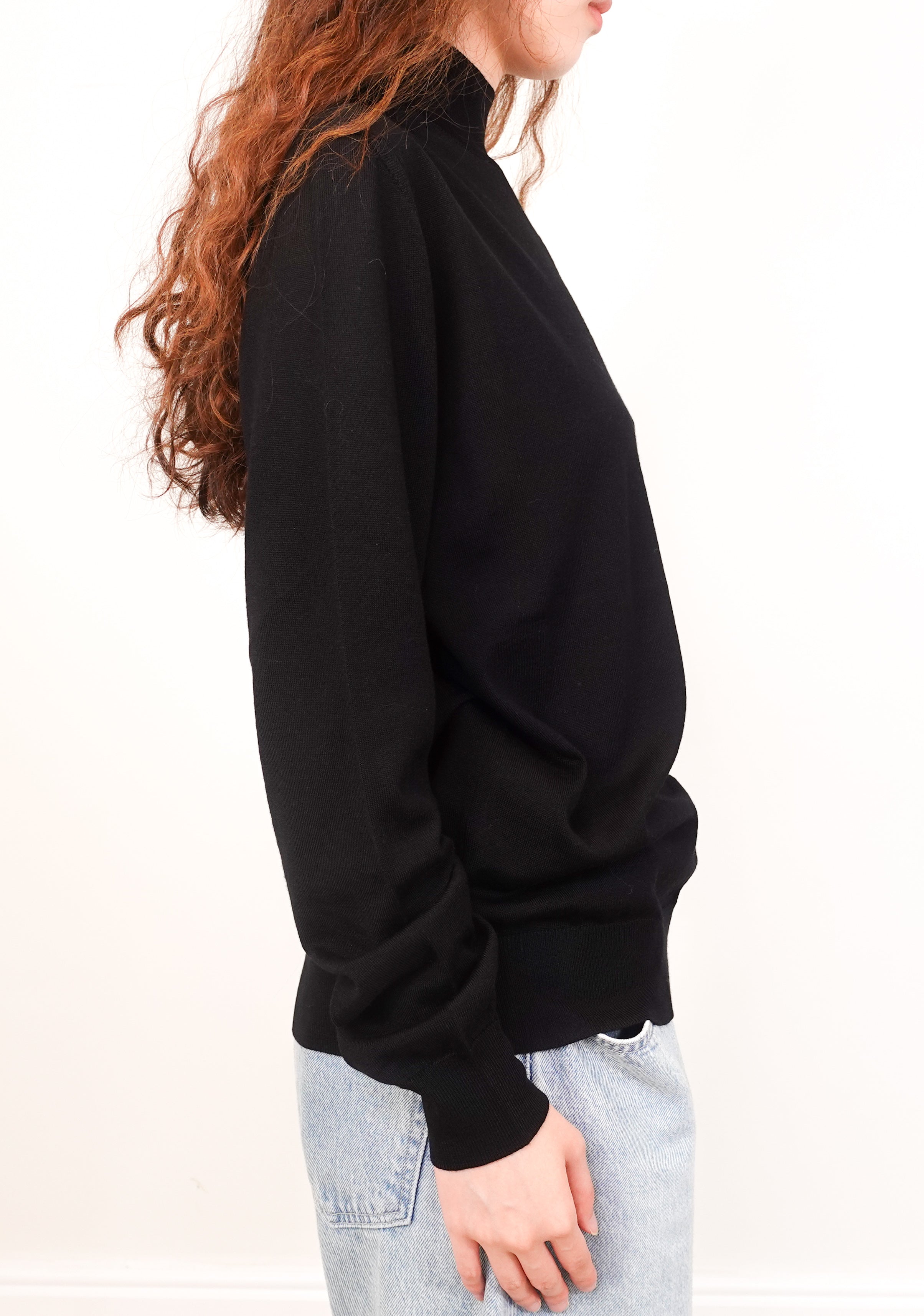 Black wool turtleneck knit top