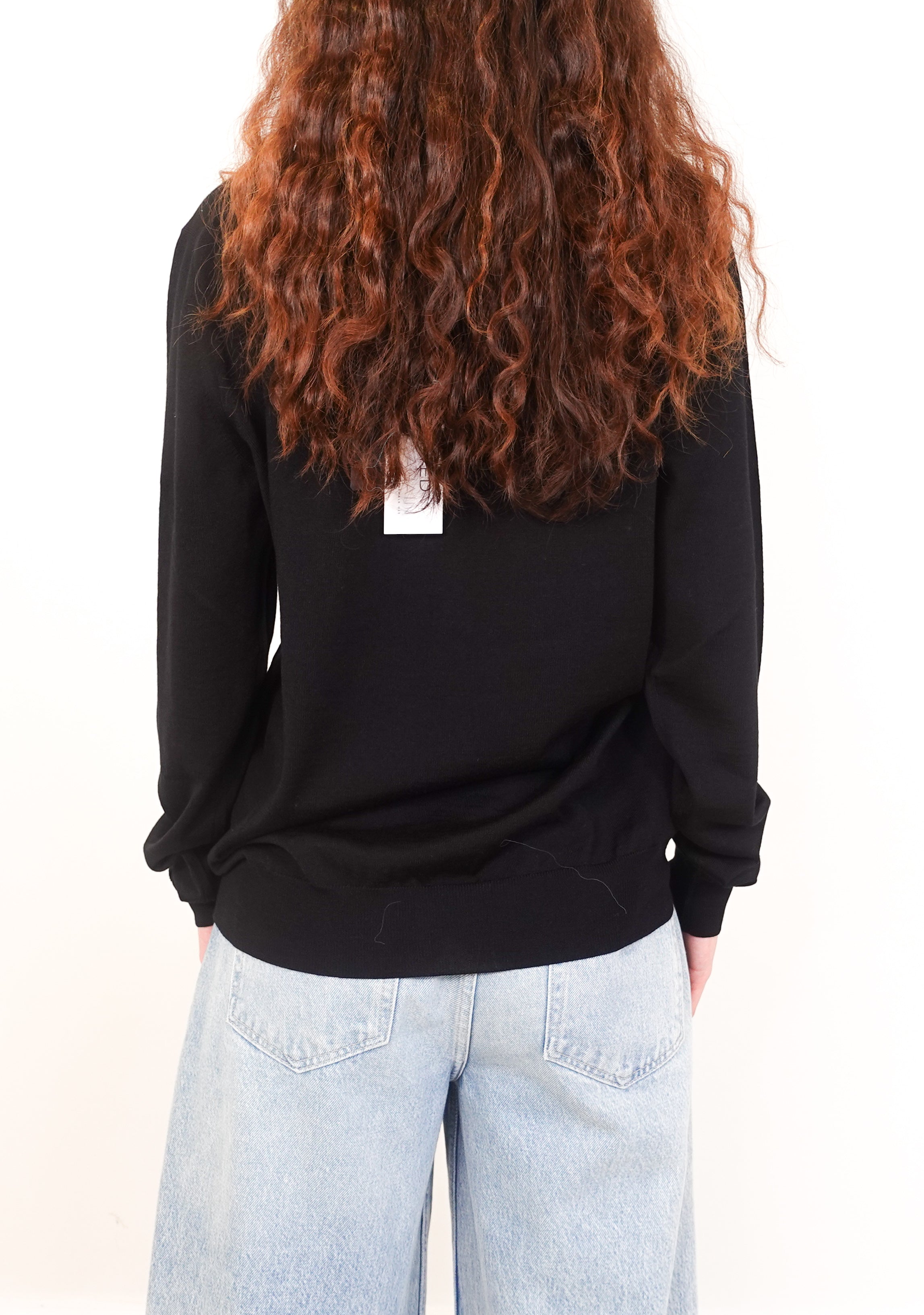 Black wool turtleneck knit top