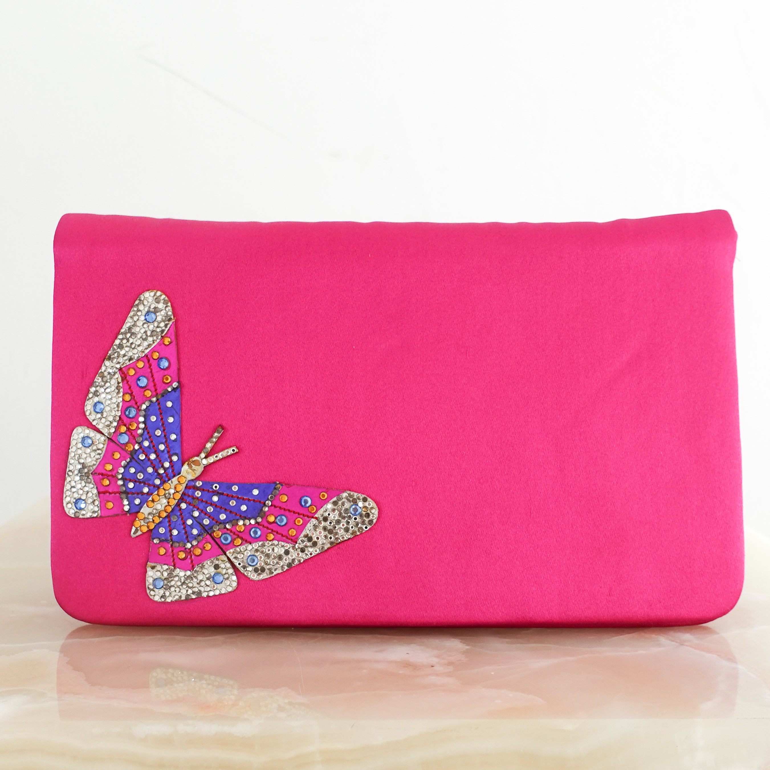 Hot pink clutch bag RRP £1k