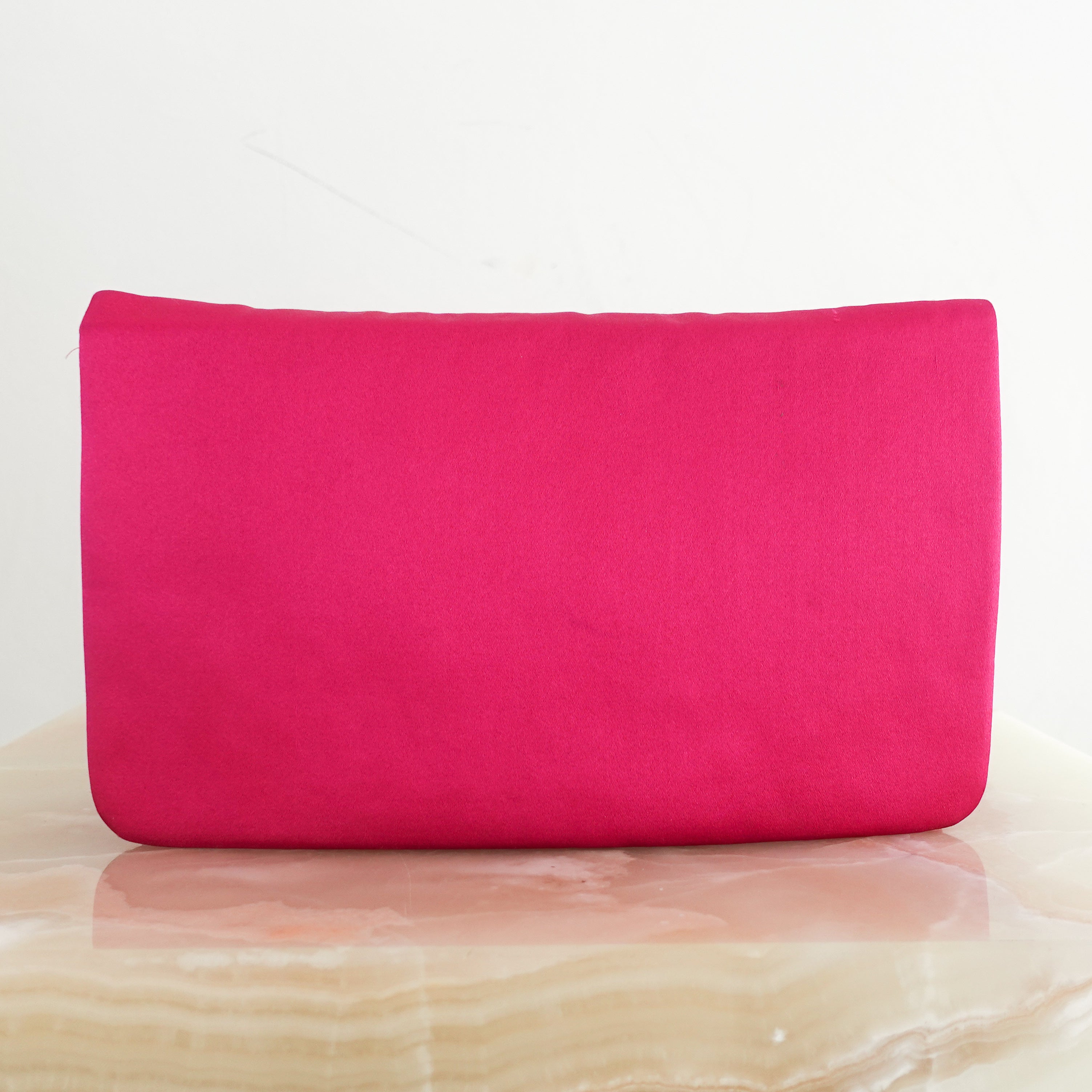 Hot pink clutch bag RRP £1k