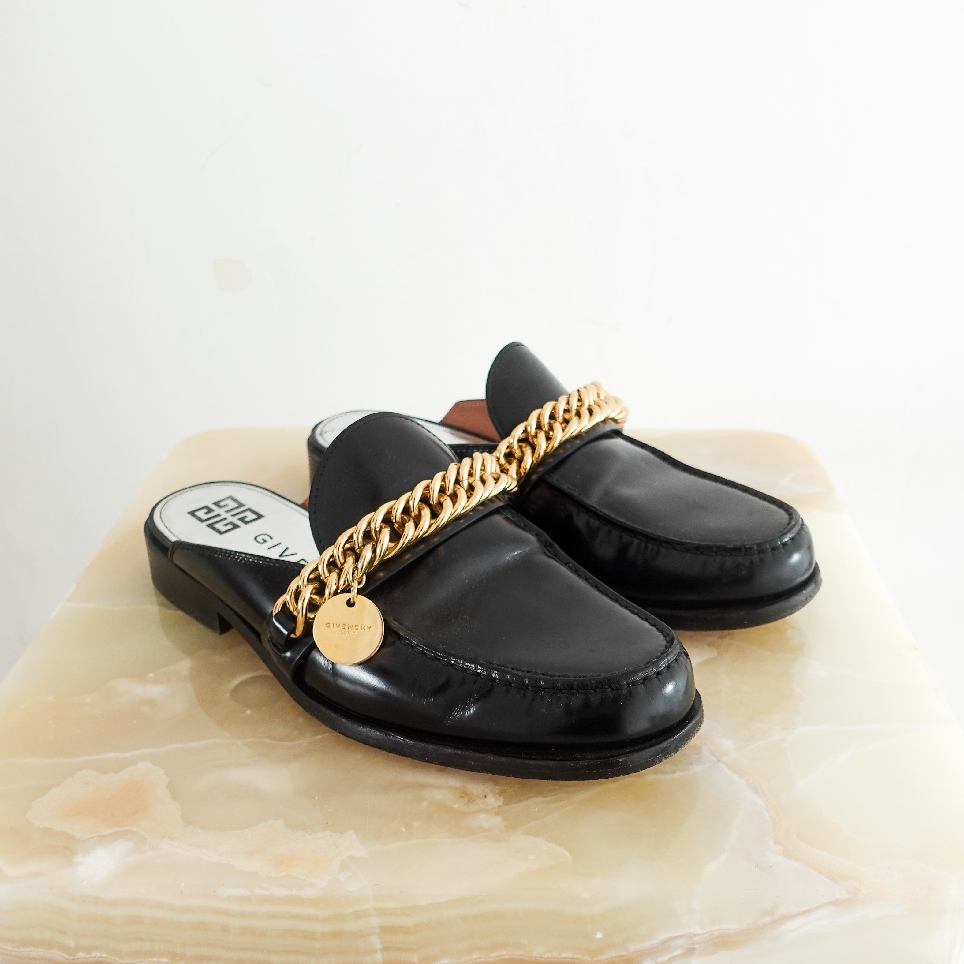 Black chain slippers RRP £700