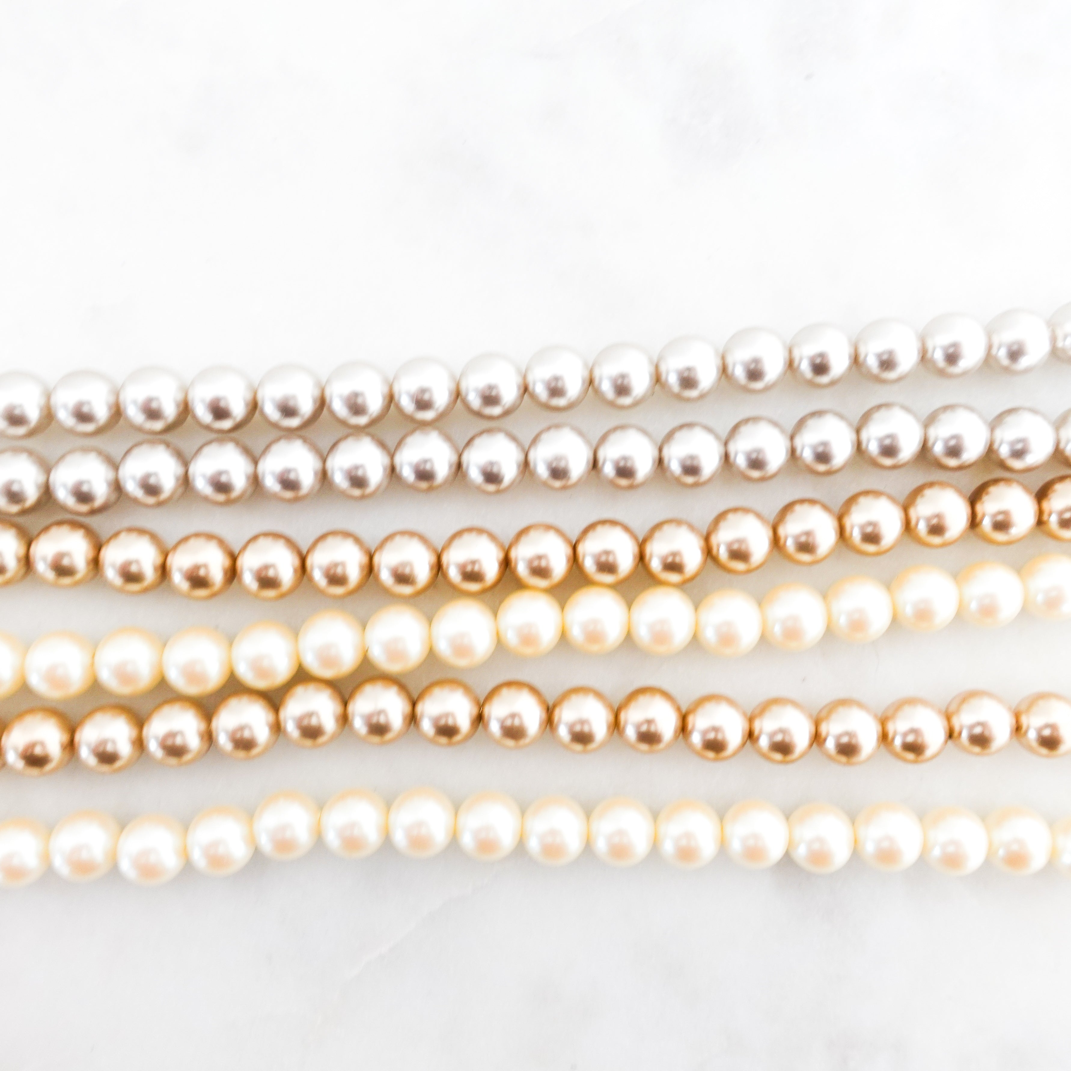 Triple pearl row necklace