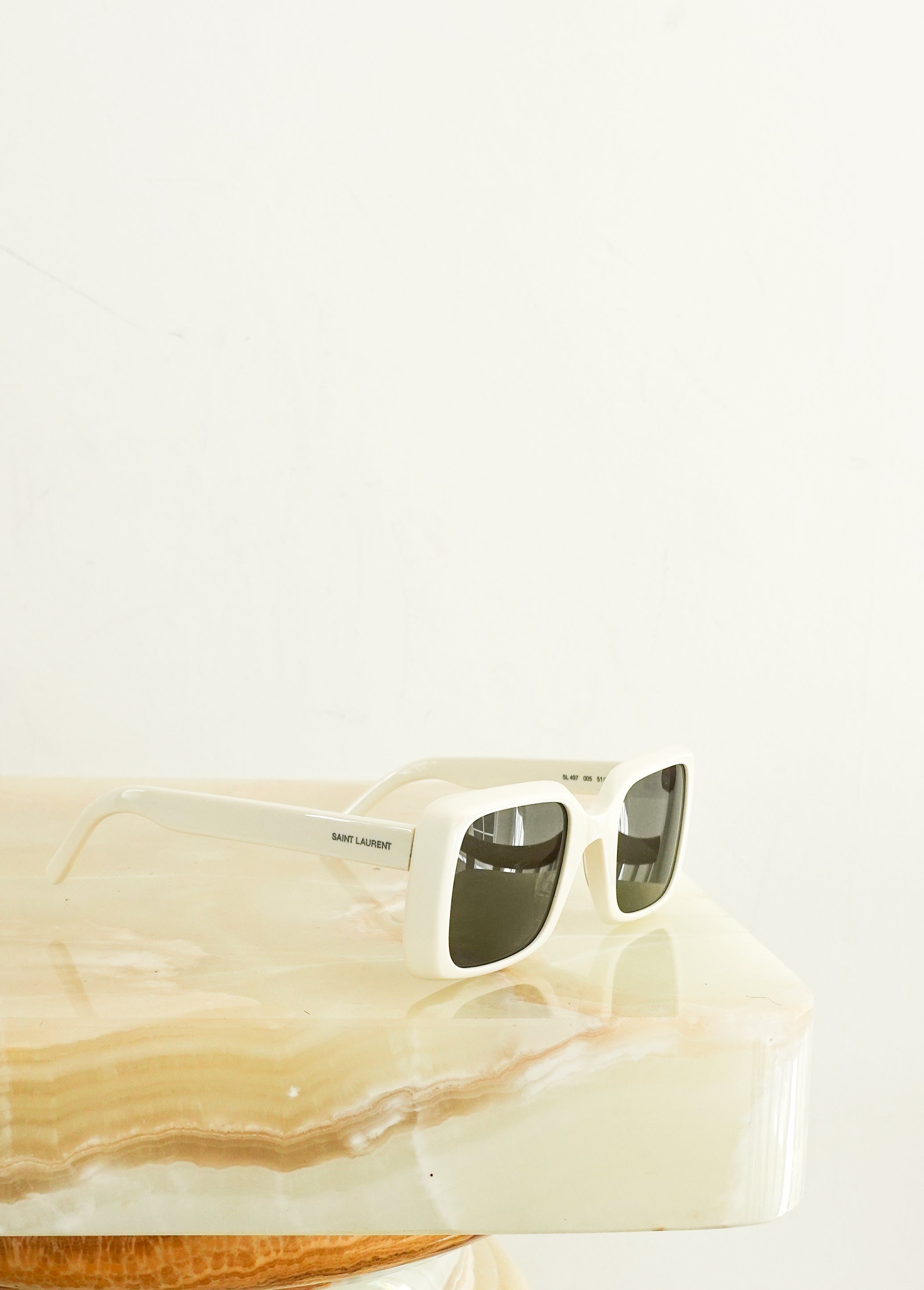 White square sunglasses RRP £300