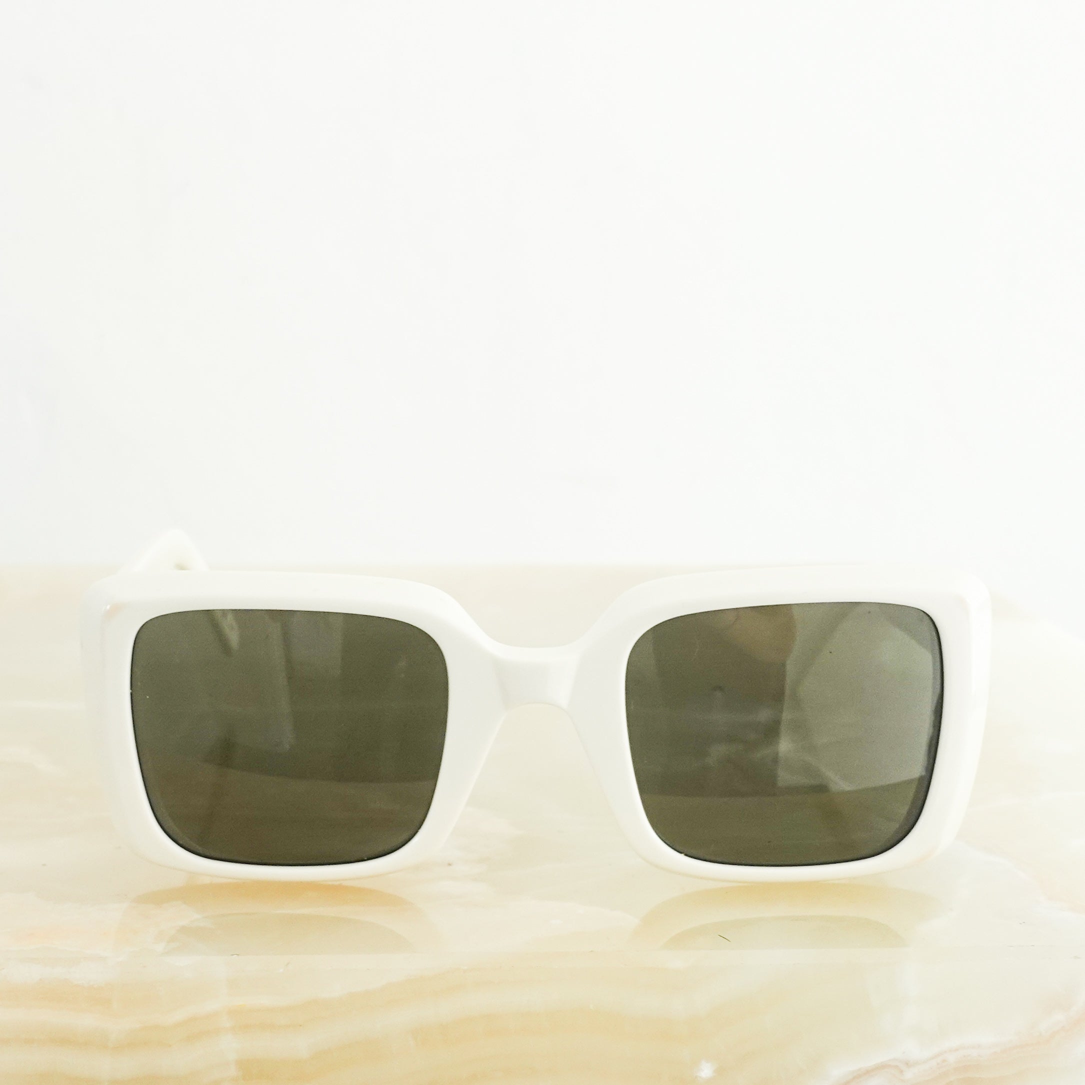 White square sunglasses RRP £300