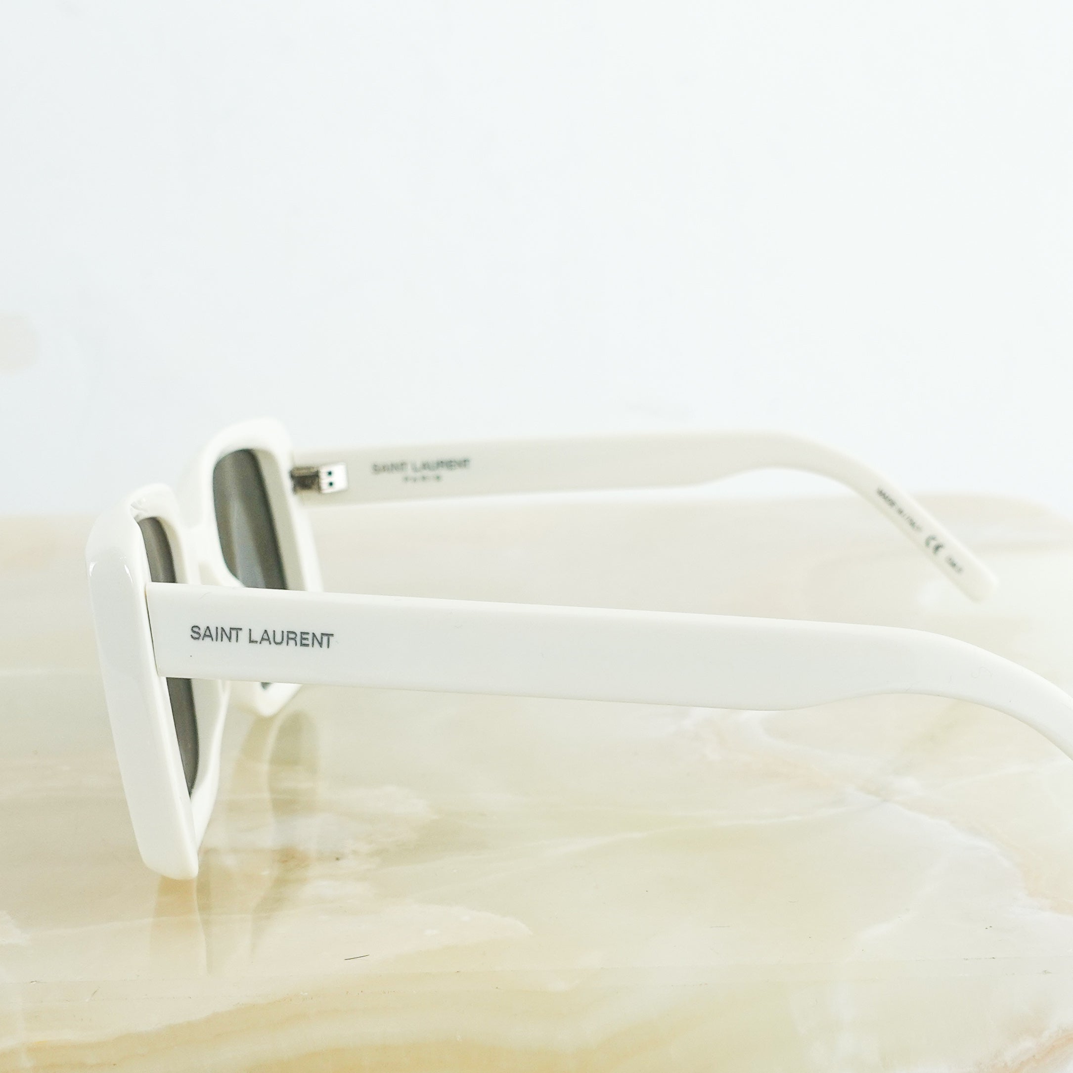 White square sunglasses RRP £300