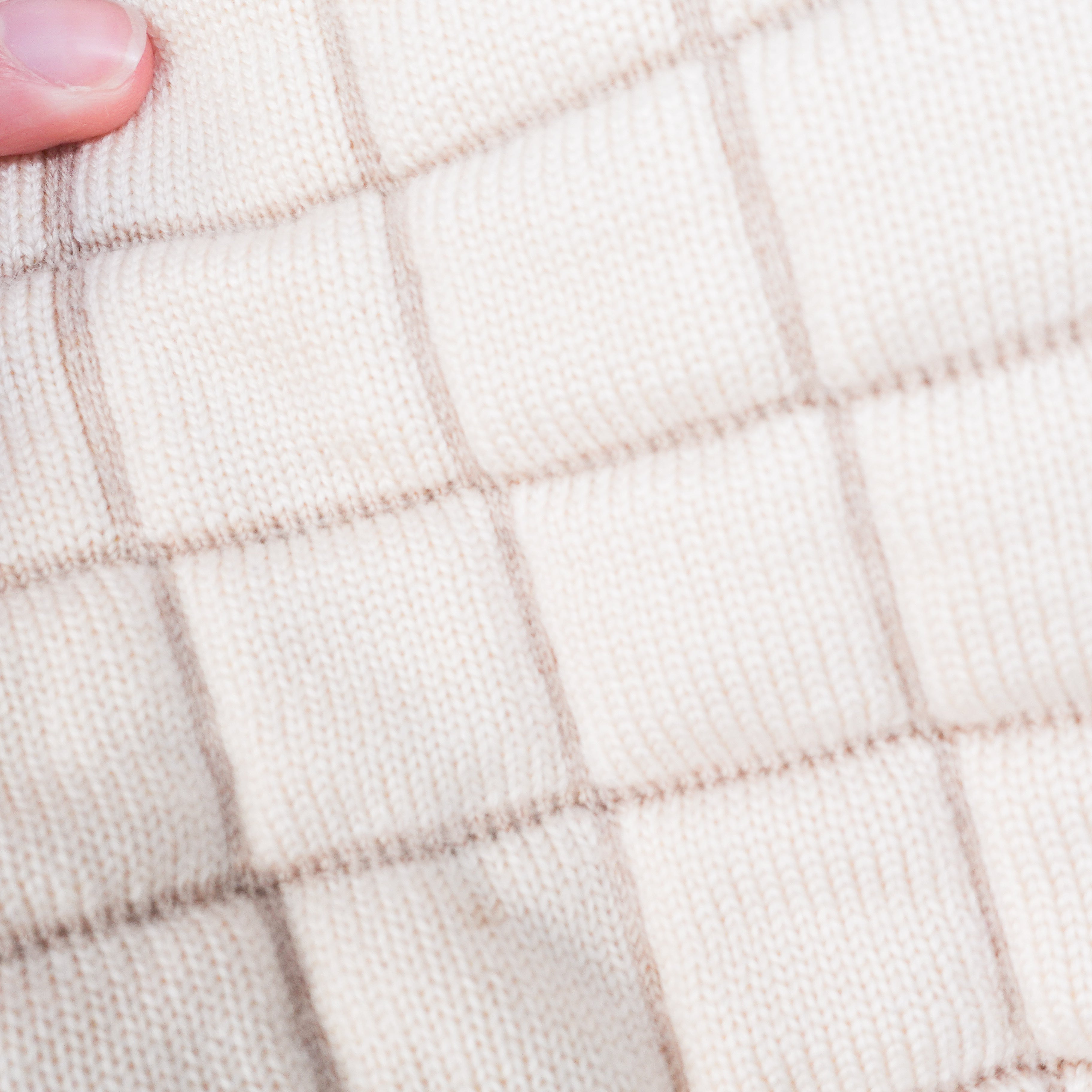 Beige turtleneck with quilting