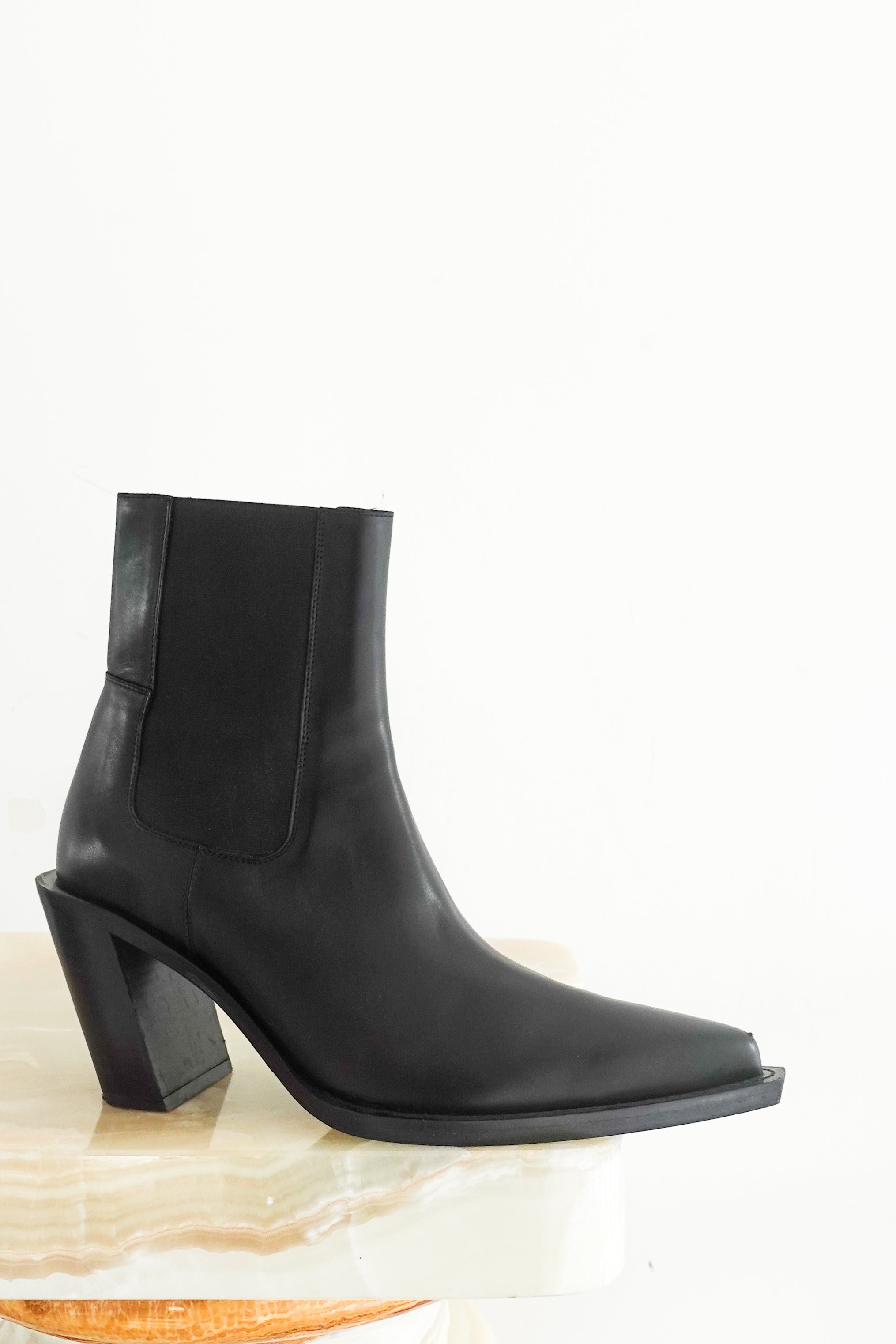 Black Chelsea boots RRP £530