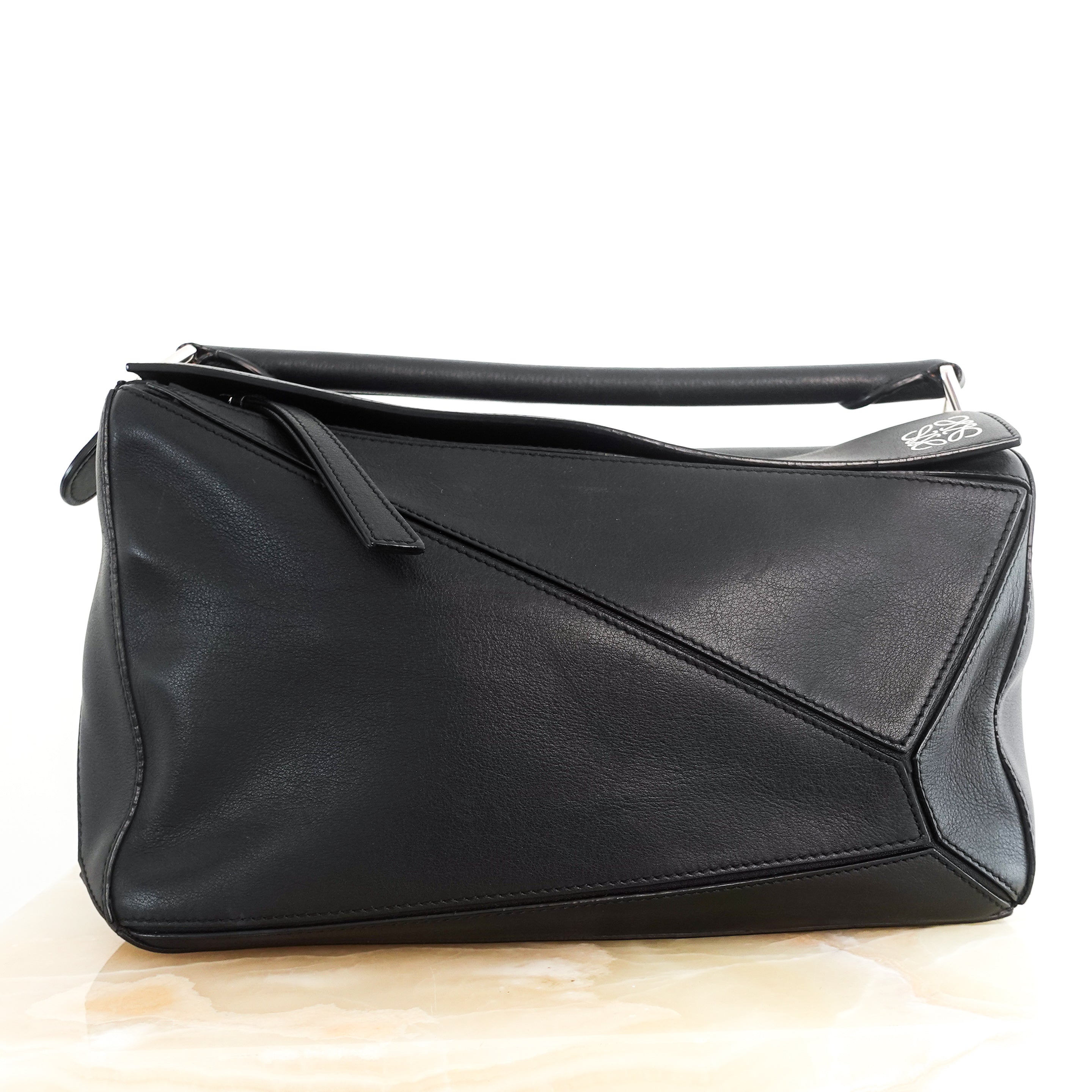 Large puzzle bag in black calfskin RRP £3750