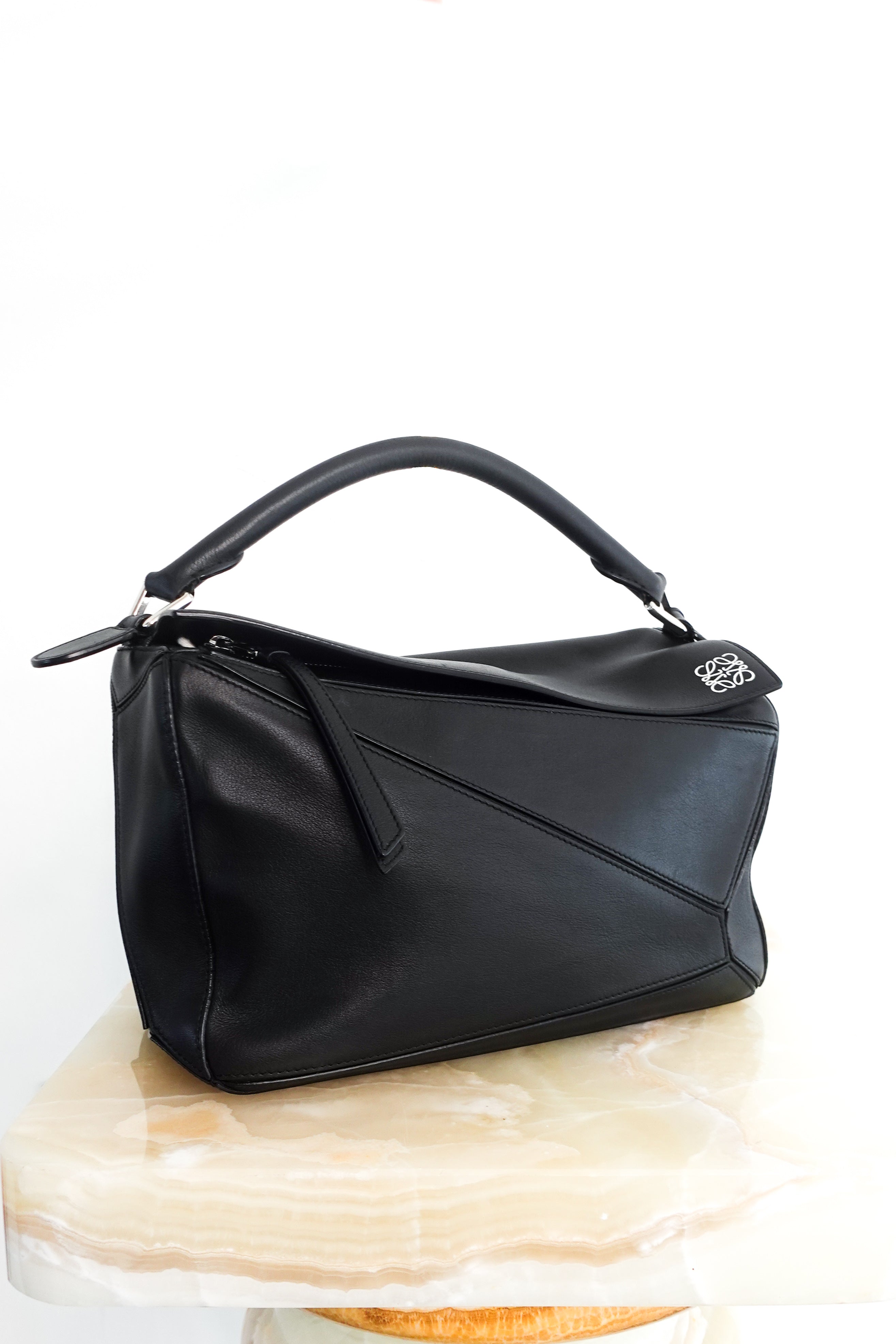 Large puzzle bag in black calfskin RRP £3750