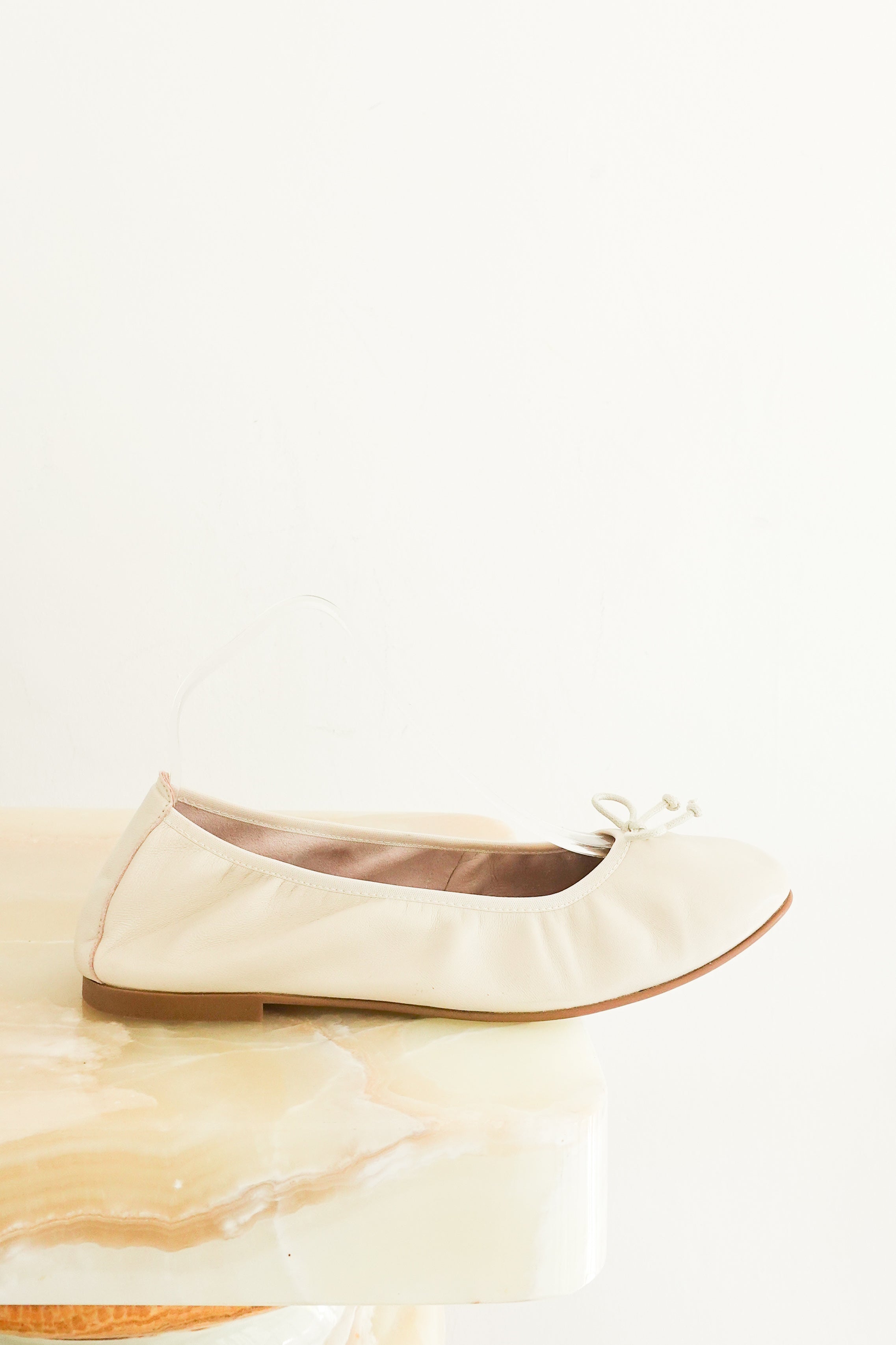 Cream ballet pumps RRP £199