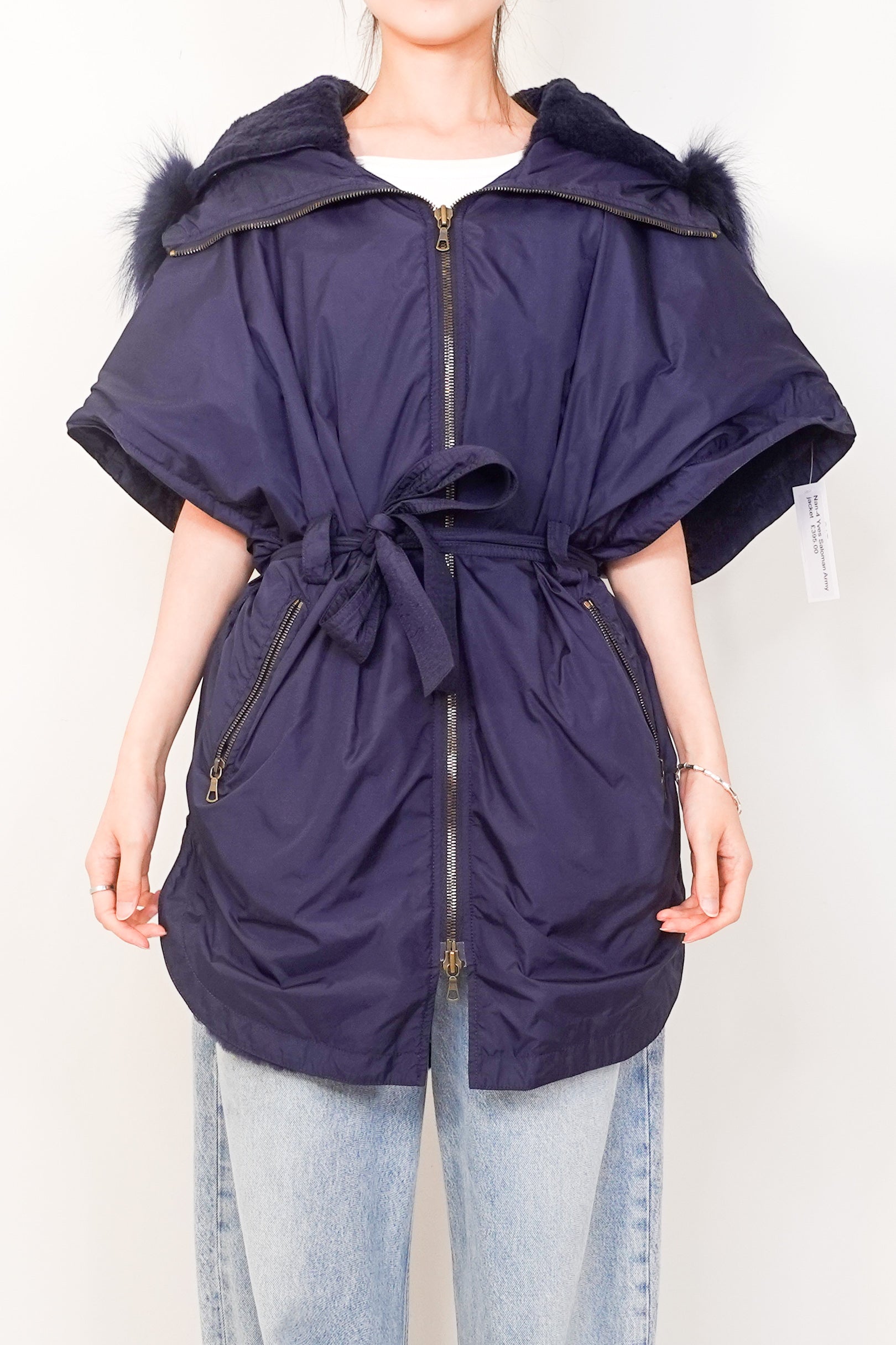 Sleeveless navy coat RRP £872