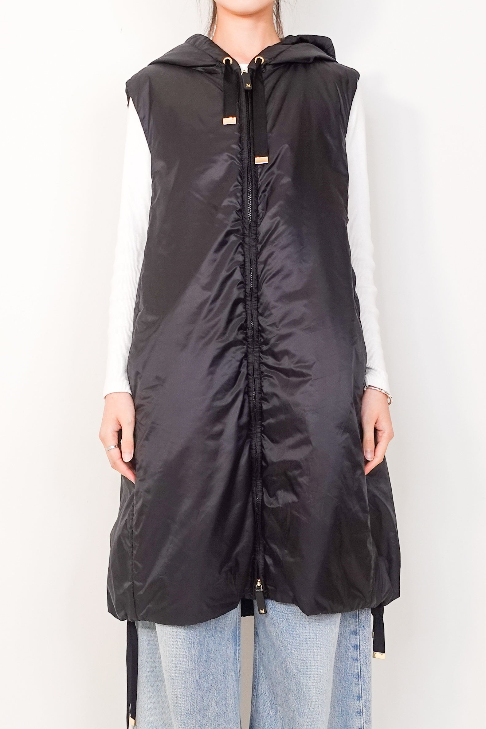 Black sleeveless cube coat RRP £550