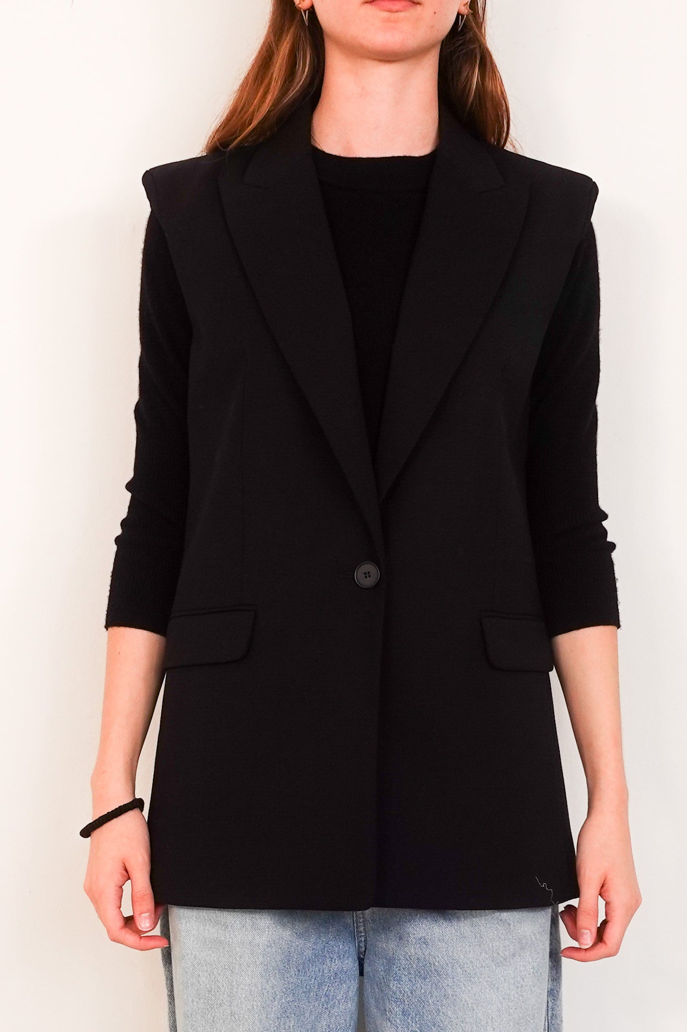 Black sleeveless blazer RRP £425