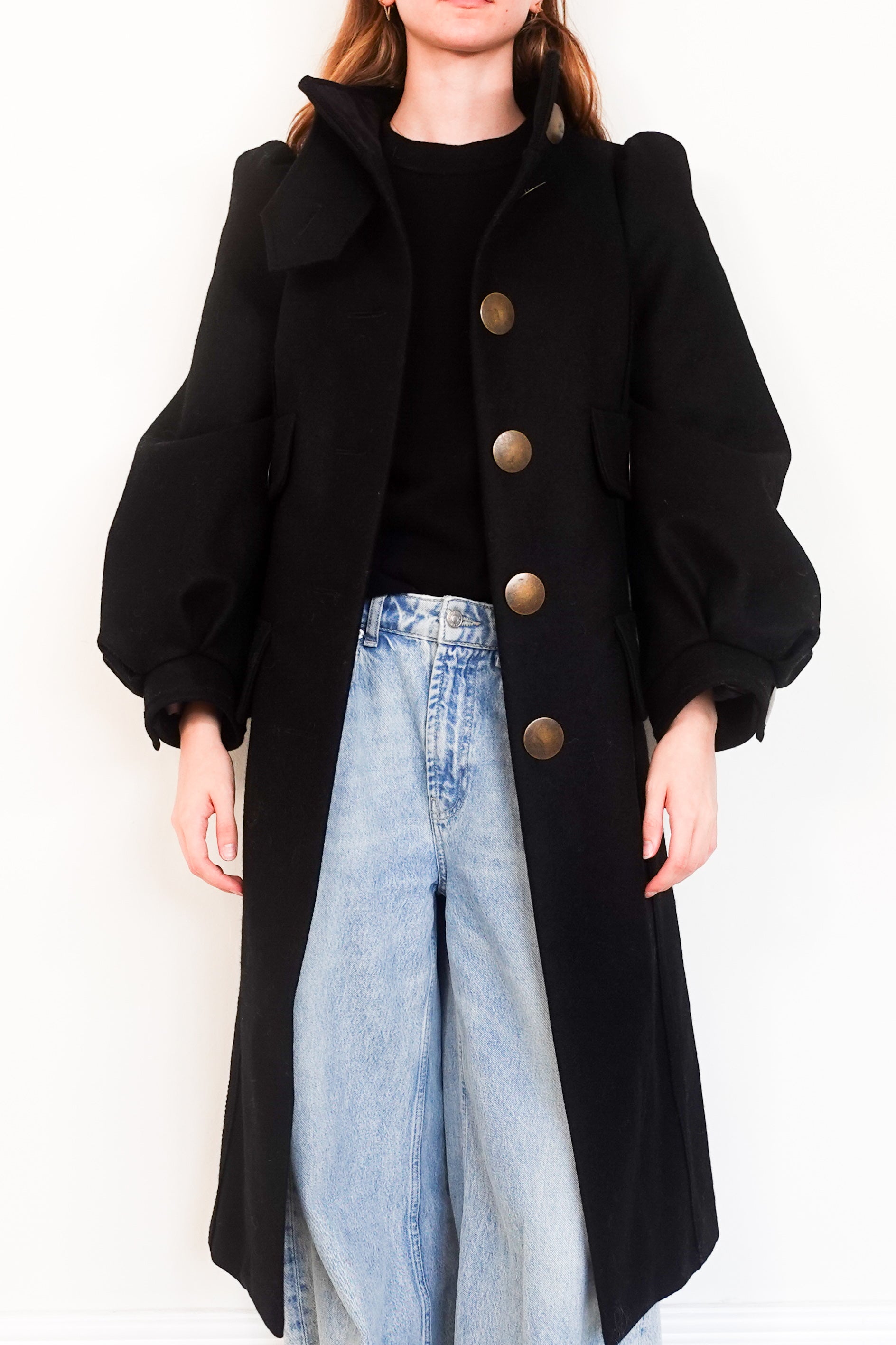 Black funnel neck statement coat