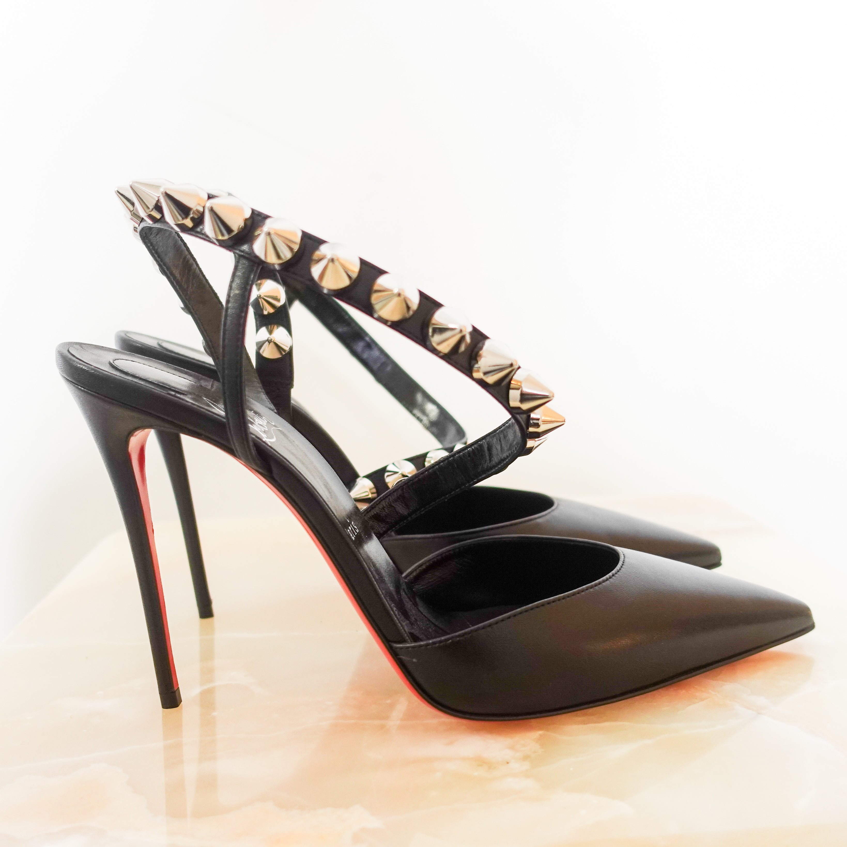 New Rockstud pointed toe heel RRP £650