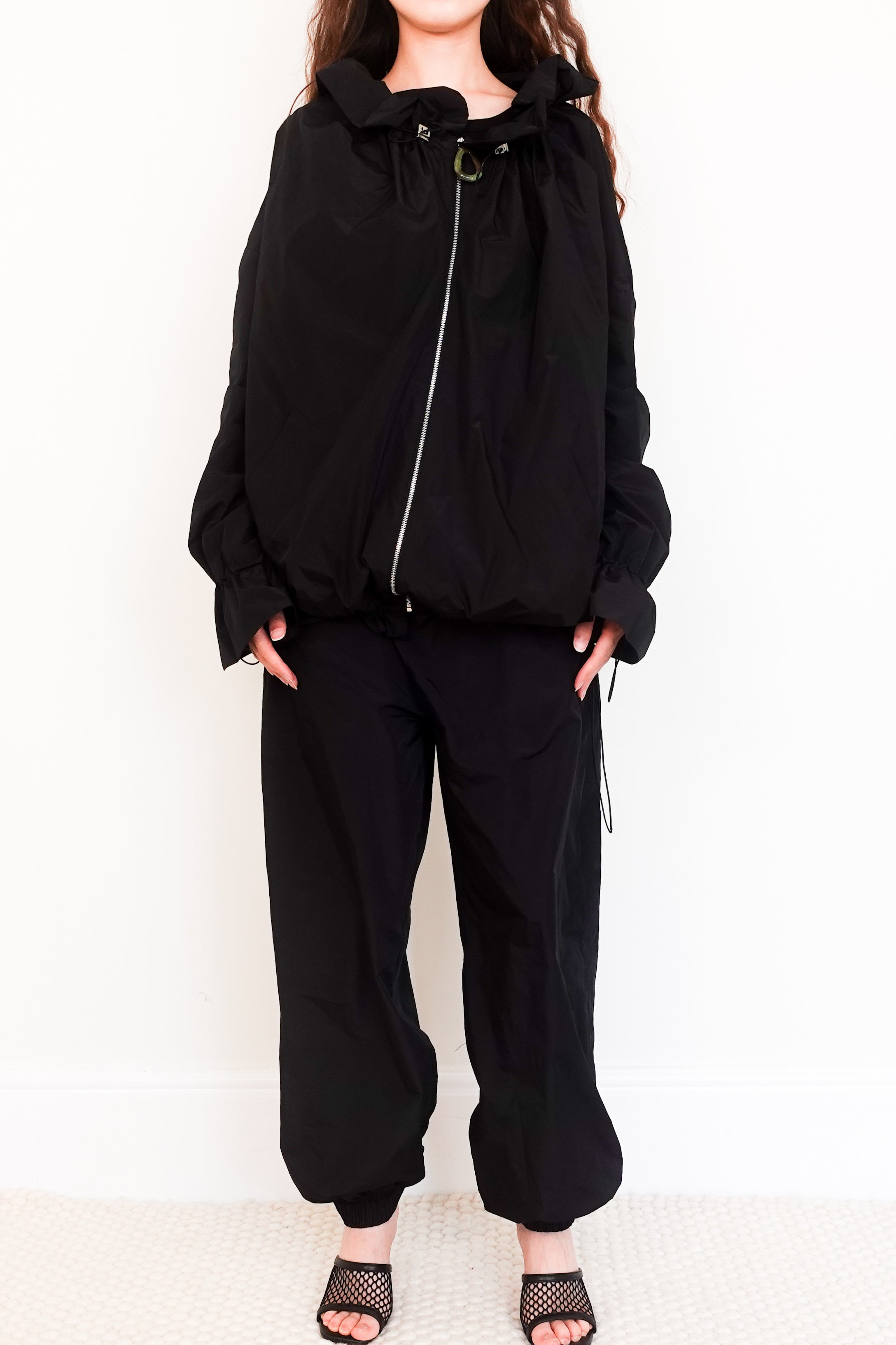 Black costume supportive tracksuit RRP £350