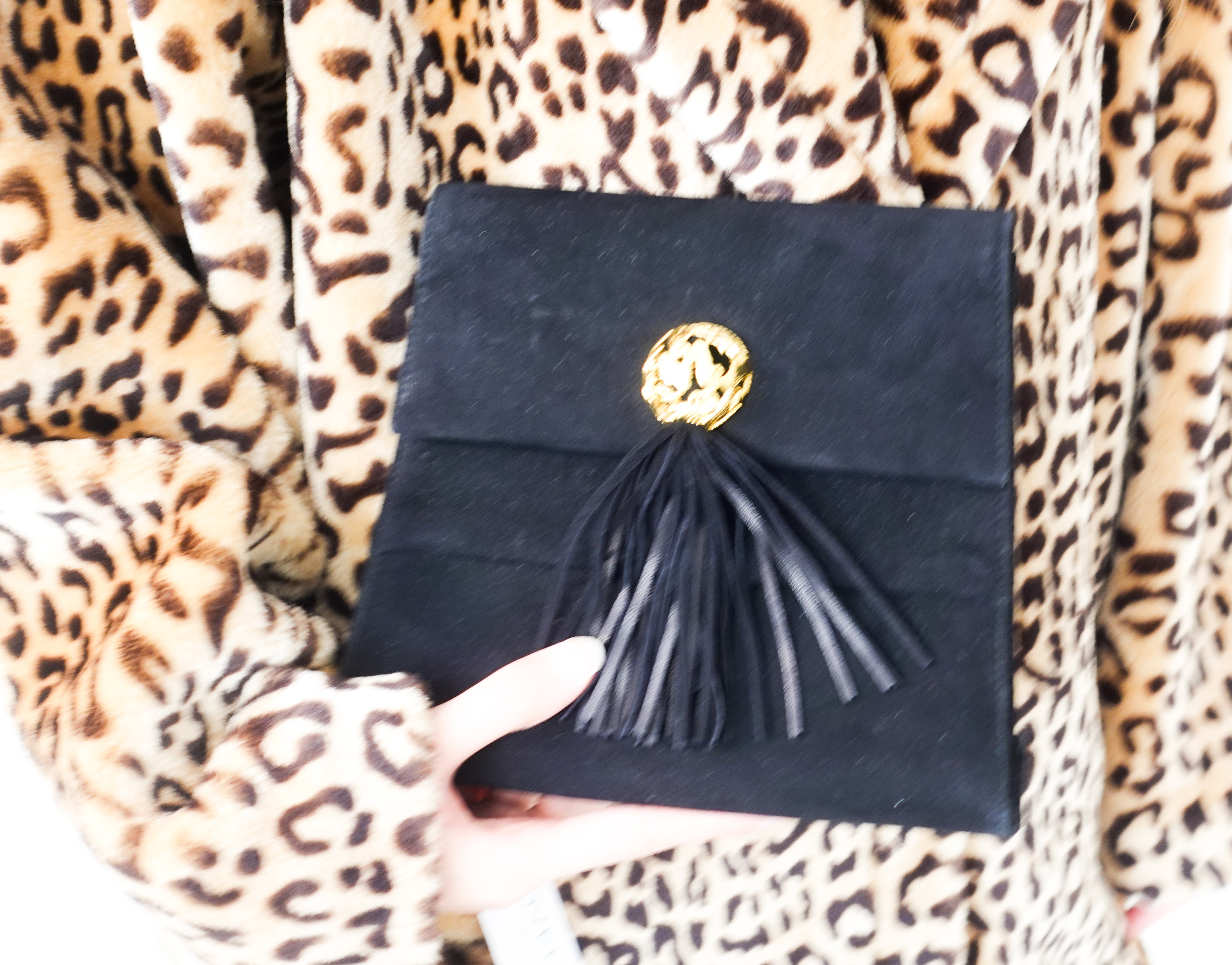 Black suede clutch bag