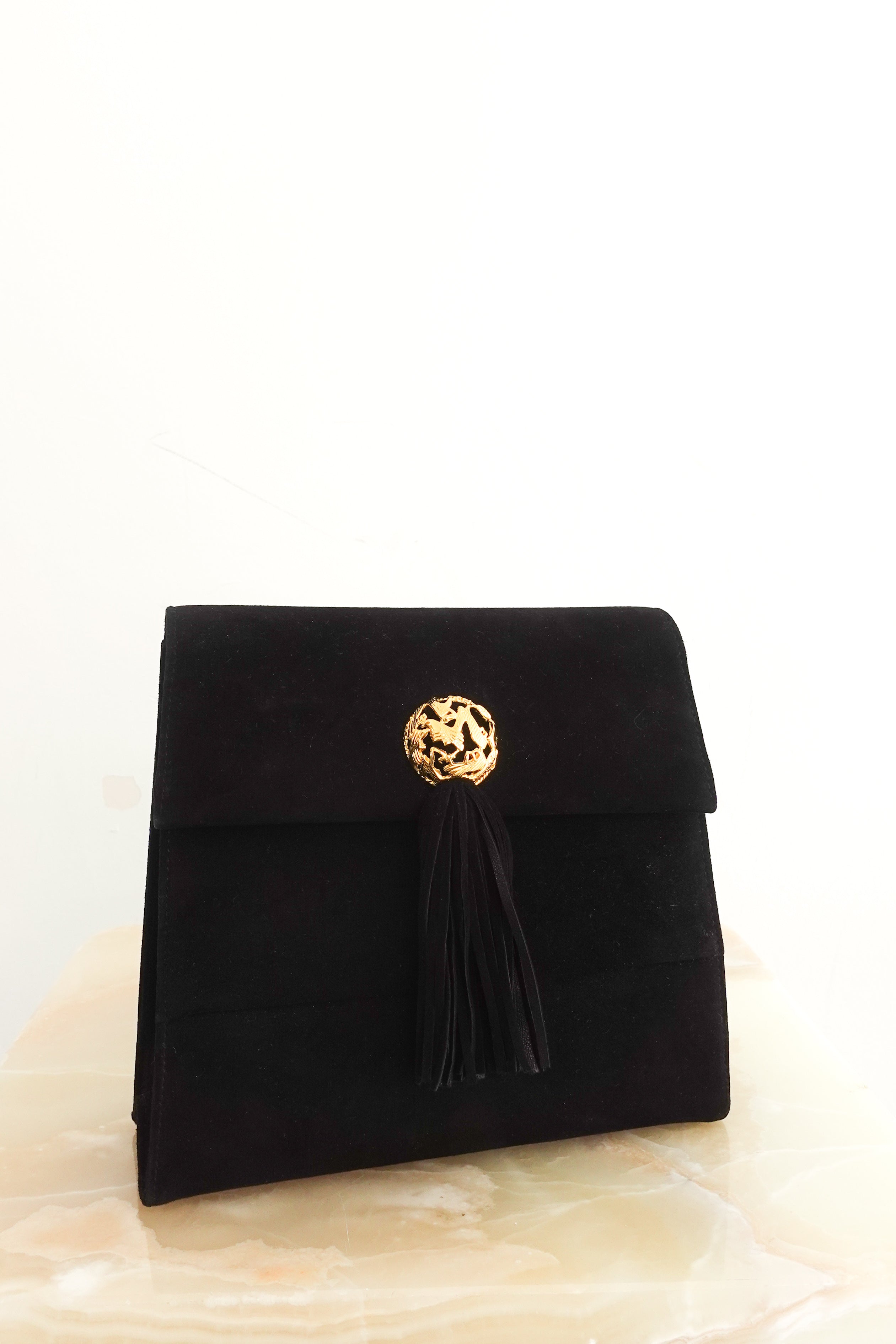 Black suede clutch bag