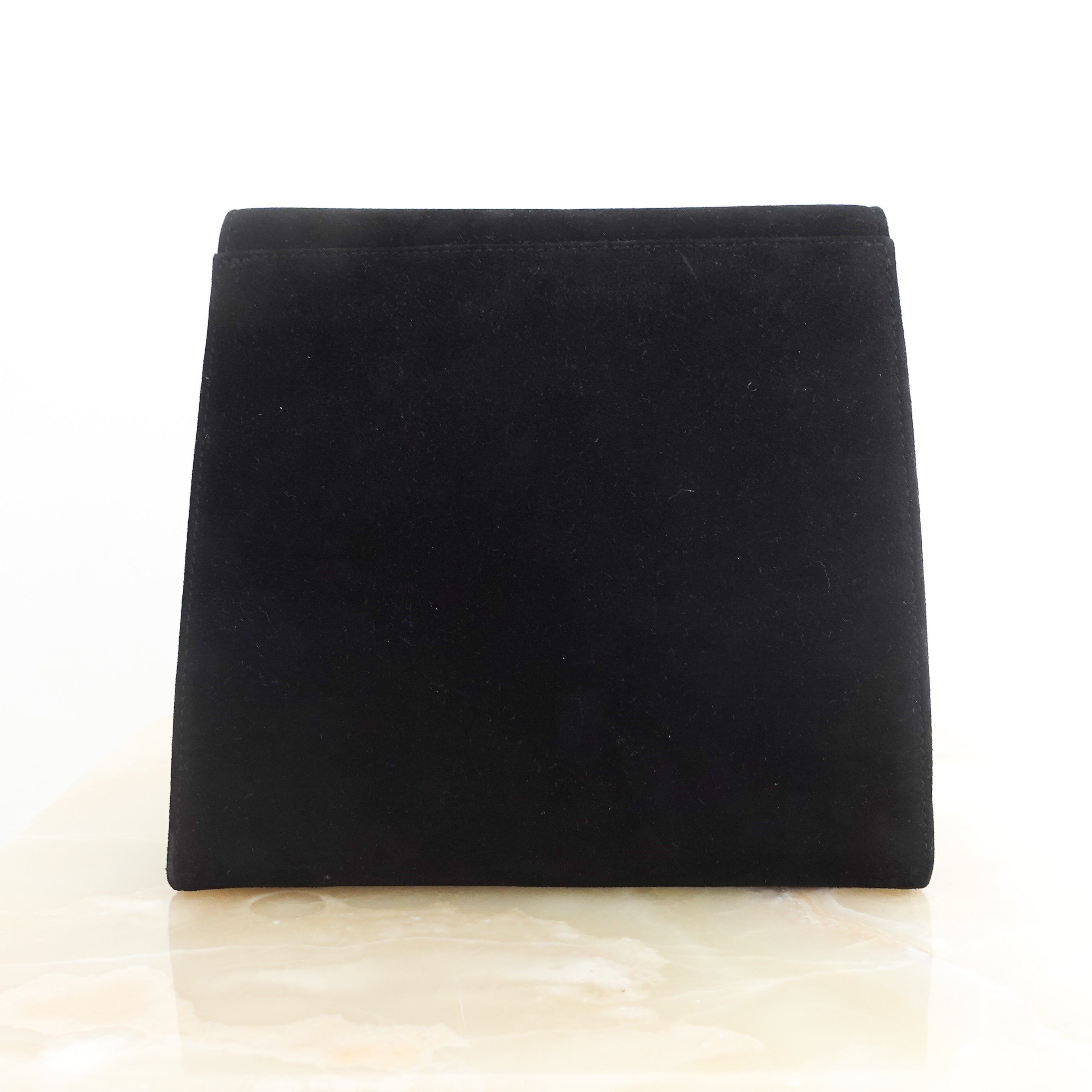 Black suede clutch bag