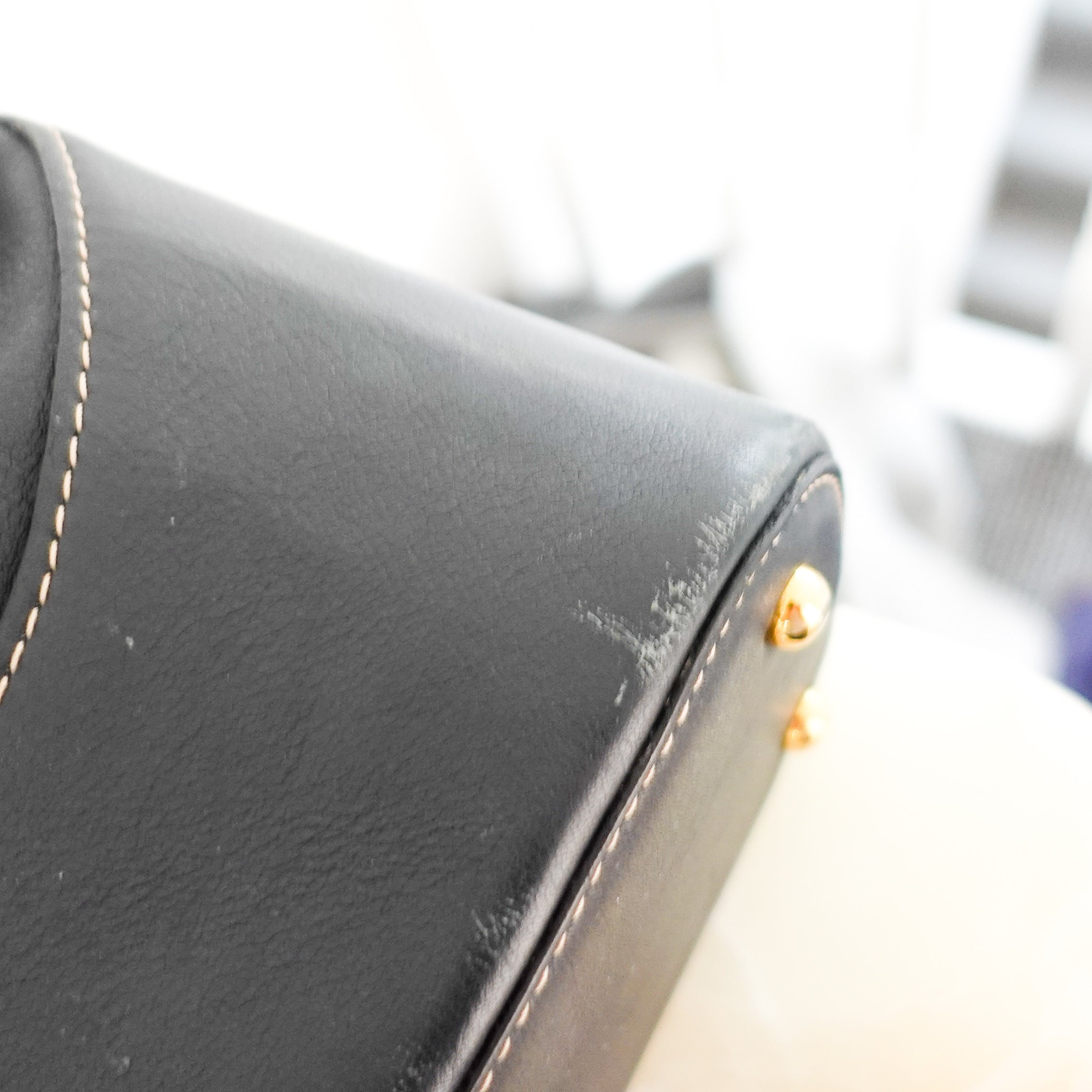 Anagram black leather crossbody bag