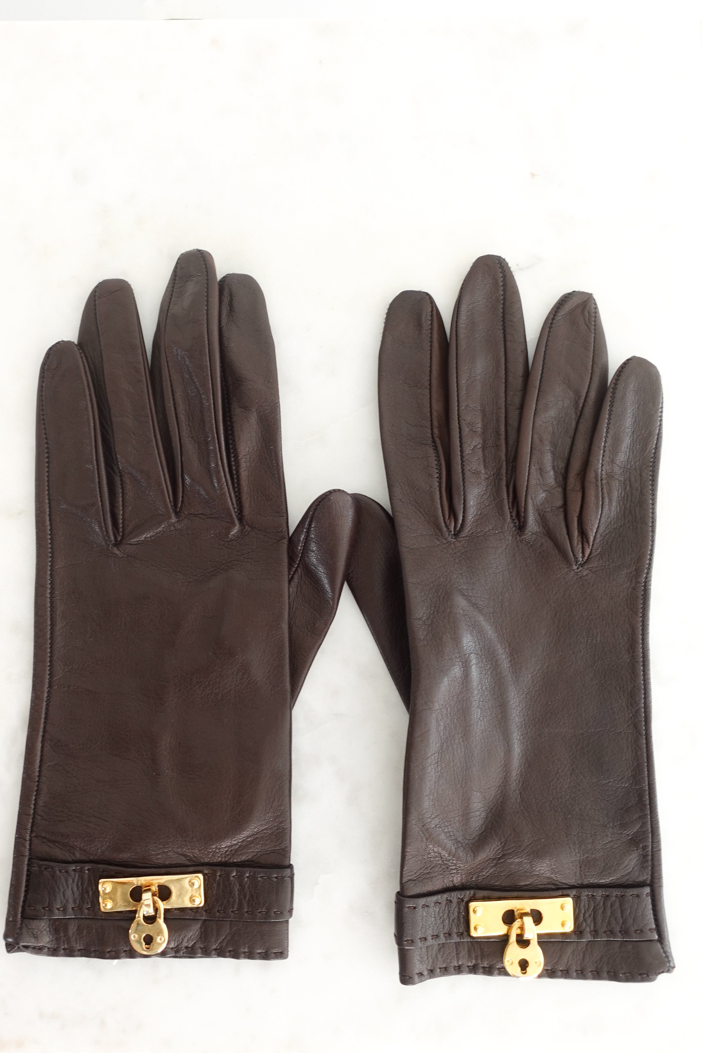 Brown leather gloves RRP £185