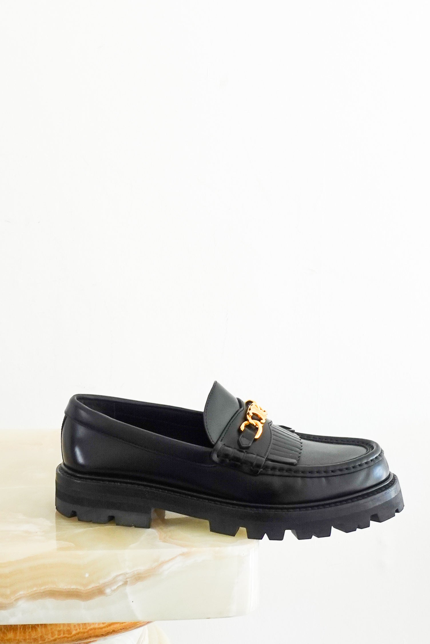 Black leather loafers RRP £850