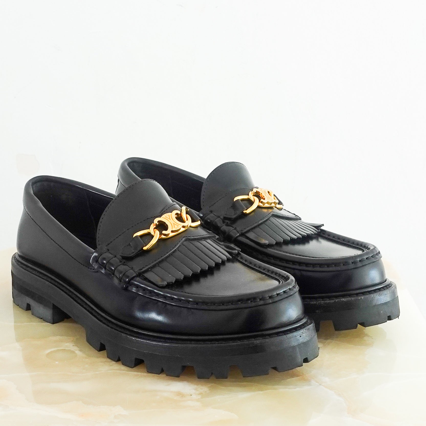 Black leather loafers RRP £850