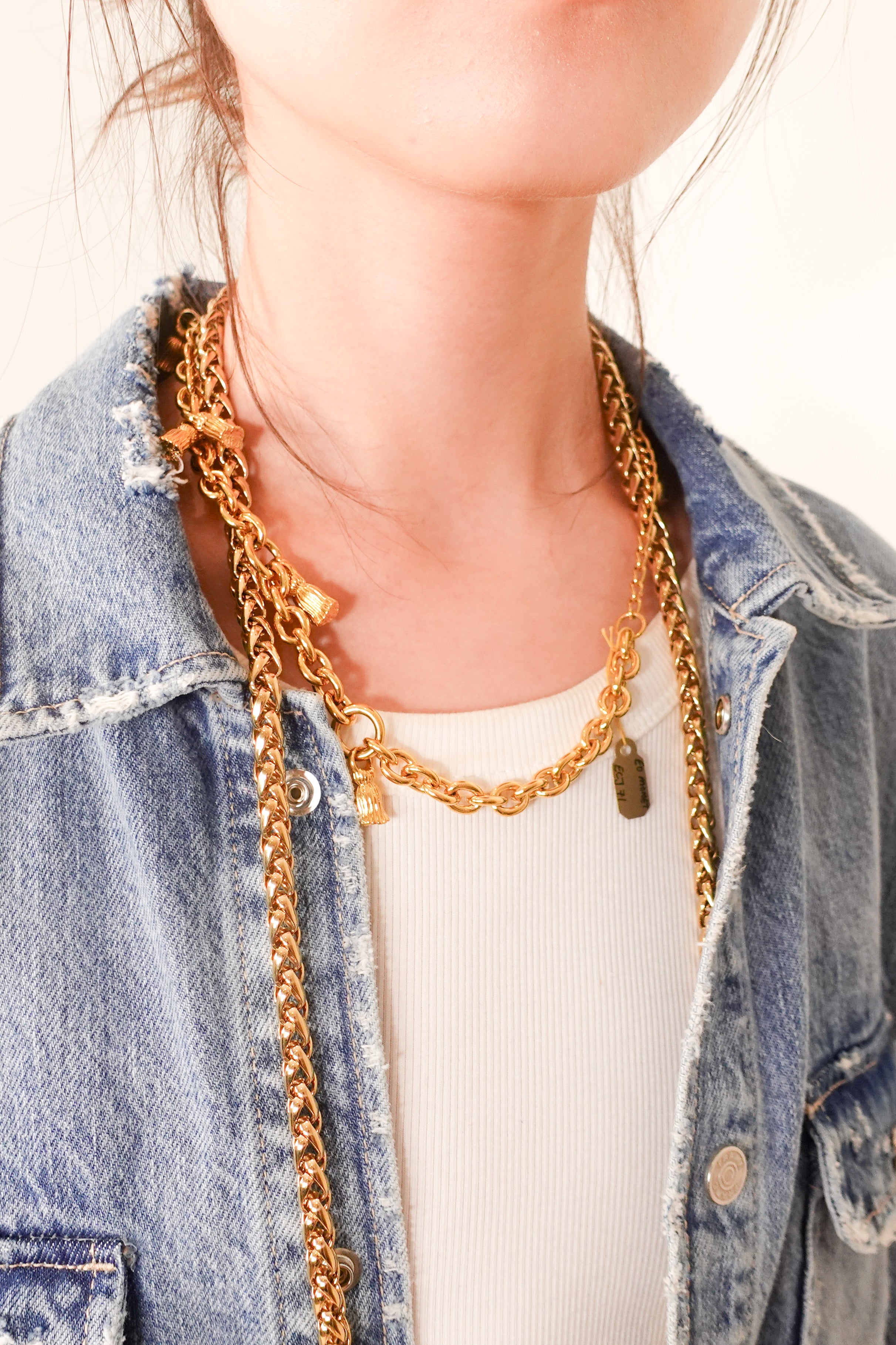 Gold plated necklace with tassles