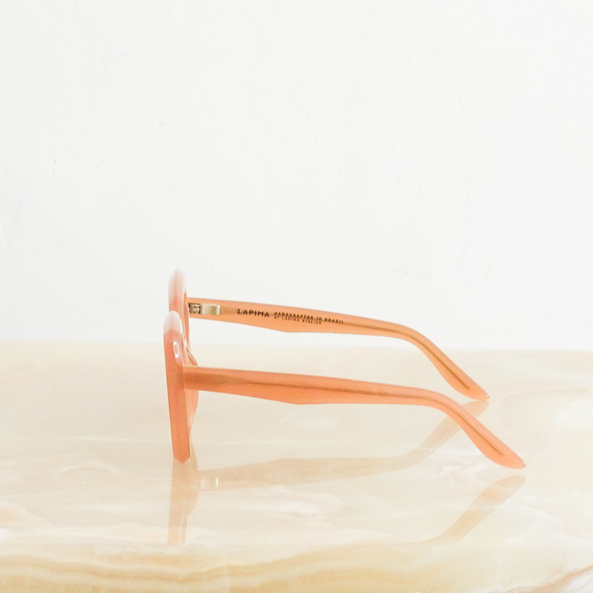 Peach sunglasses RRP £150