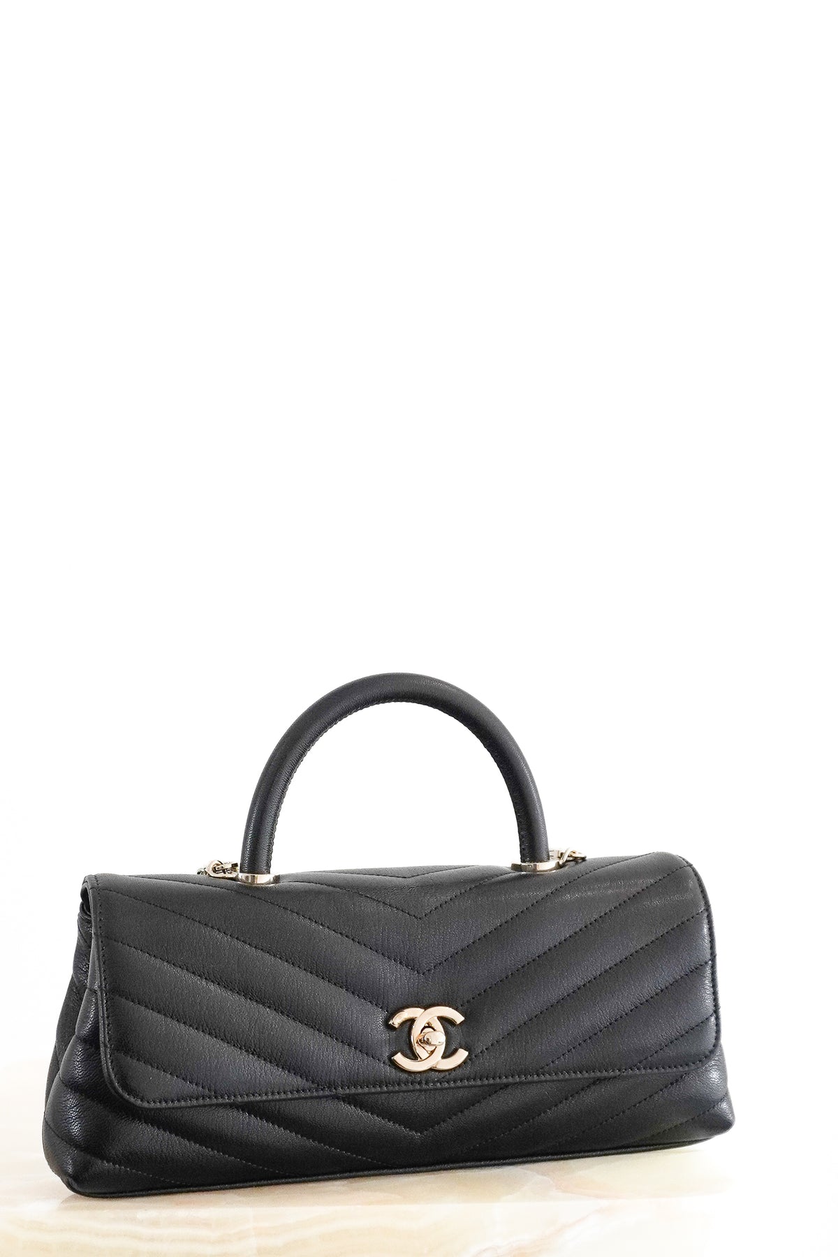 Front: Chanel Coco Top Handle Black Chevron Quilted Leather Bag