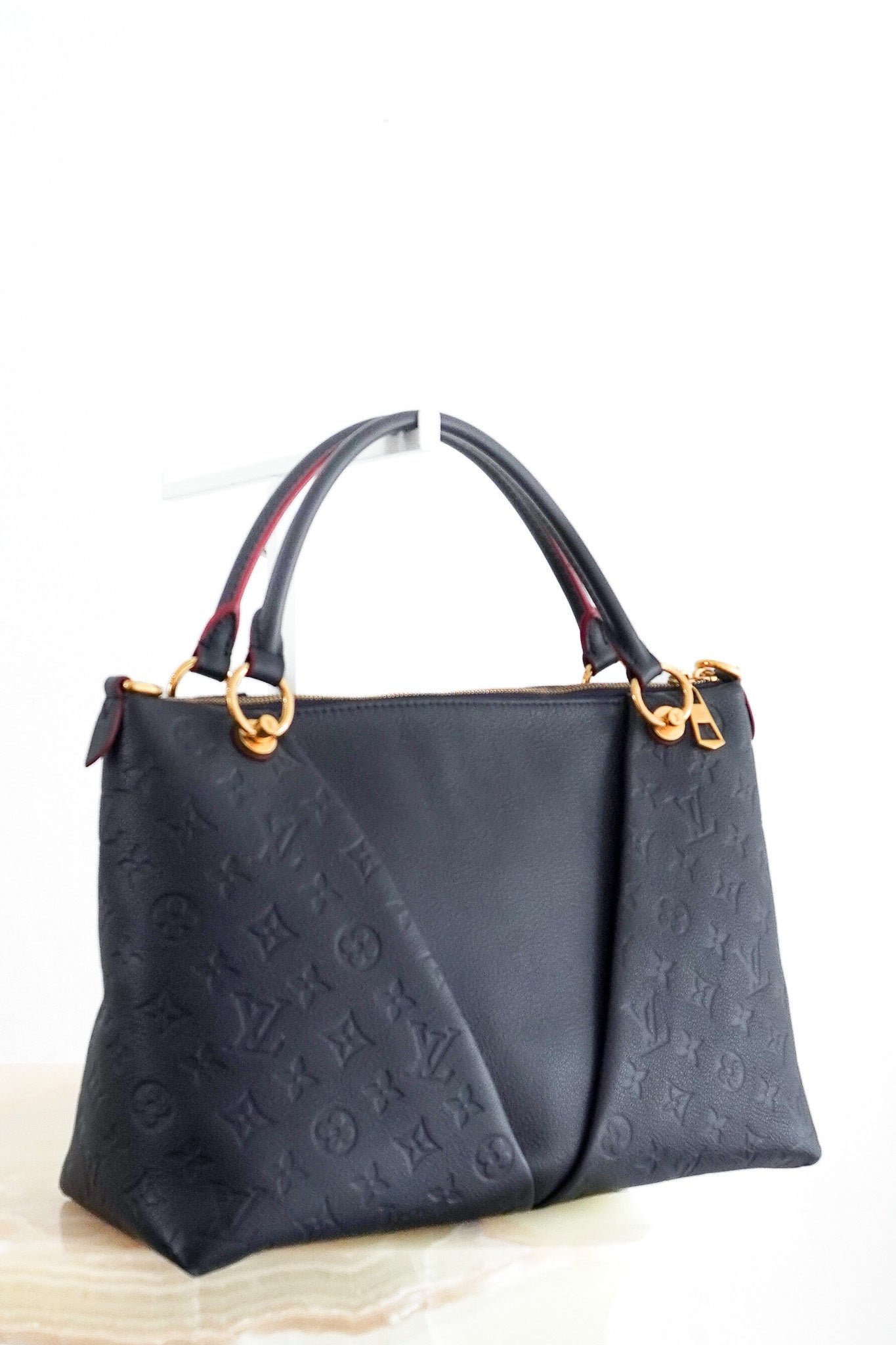 Front Image: Louis Vuitton Monogram Empreinte V Tote MM in Navy Chelsea London