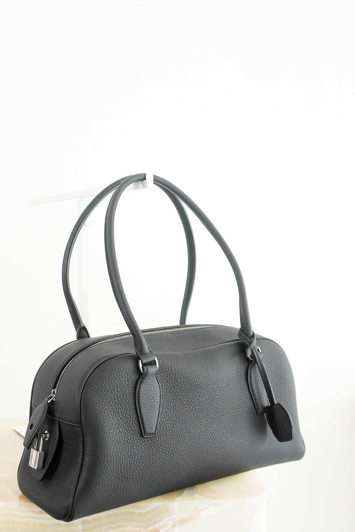 Front Image: The Row India Small Textured Leather Tote