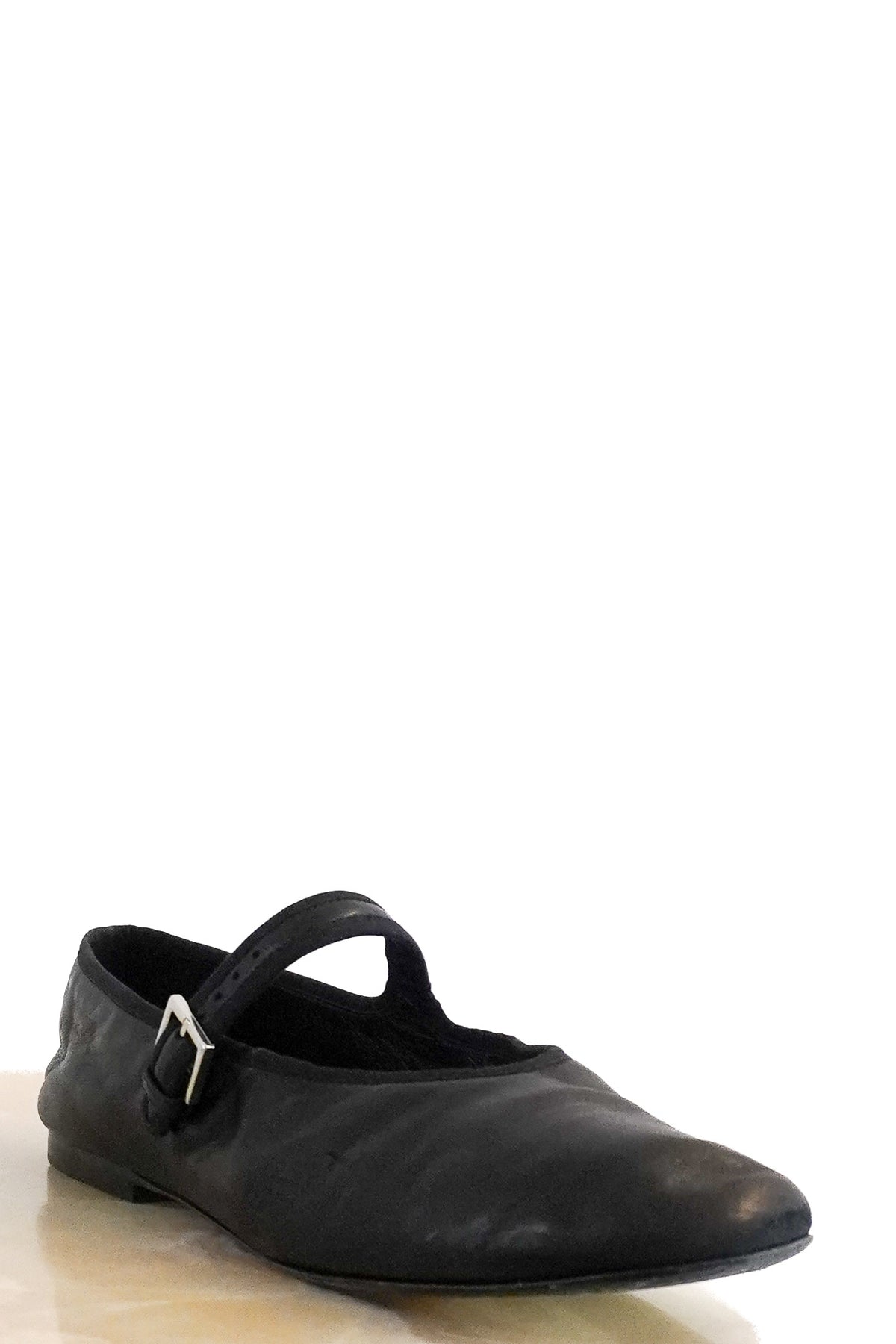 Front: The Row Leather Pumps